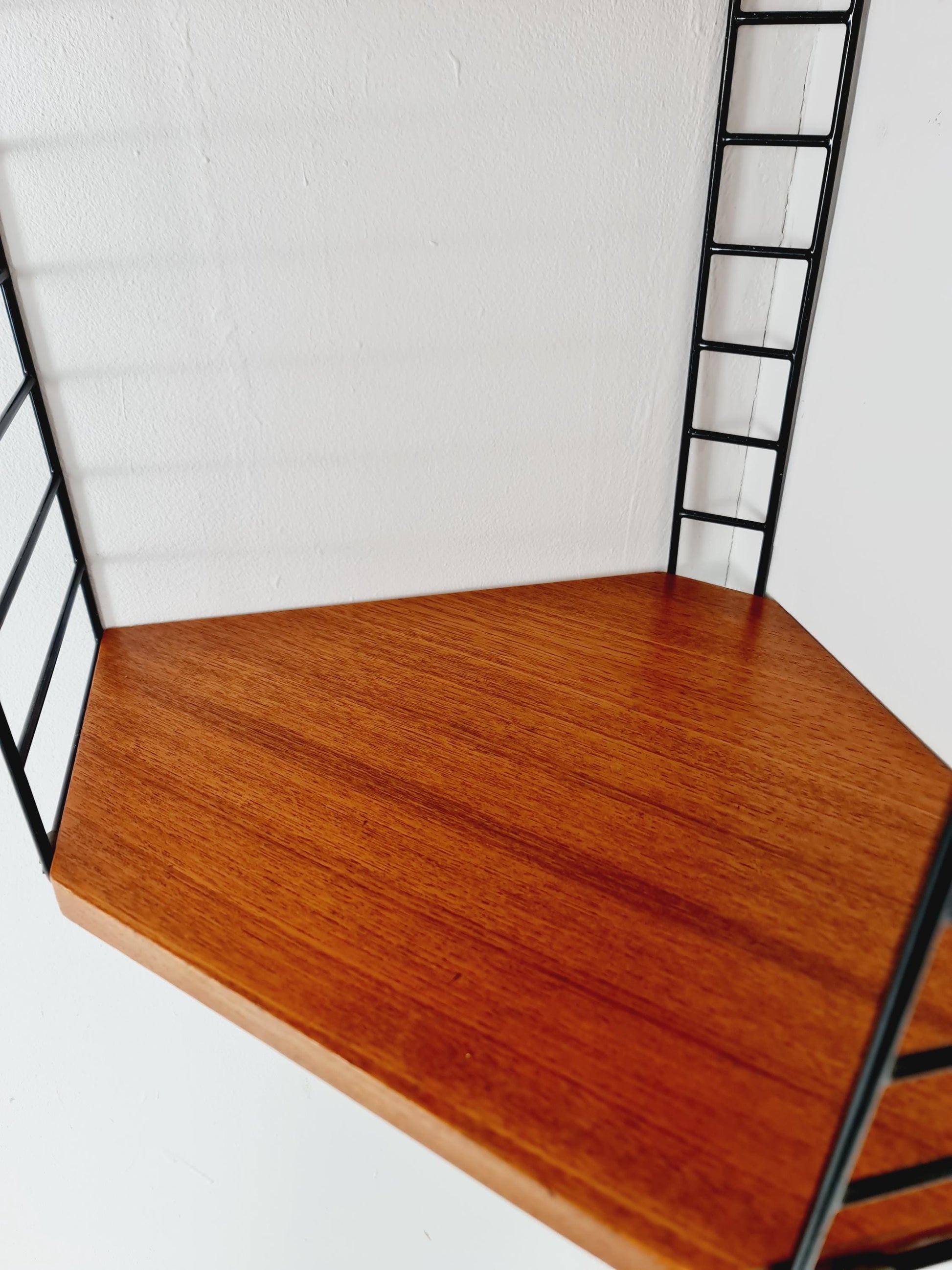 Original MCM Teak Corner shelving system - consists of Black lacquered metal ladders, from string Stockholm 1960s