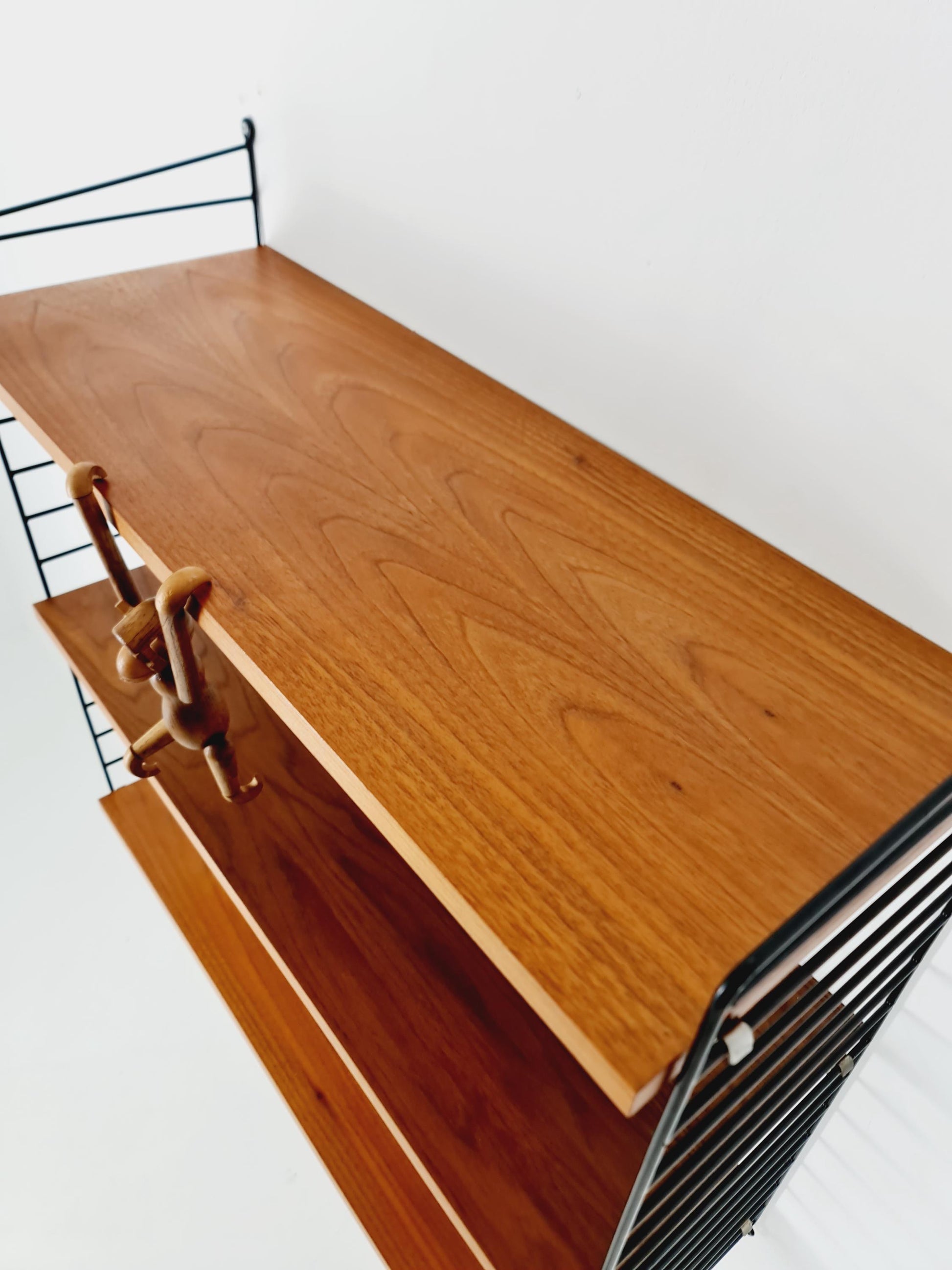 Original MCM Teak shelving system - consists of black lacquered metal ladders, from string Stockholm 1960s