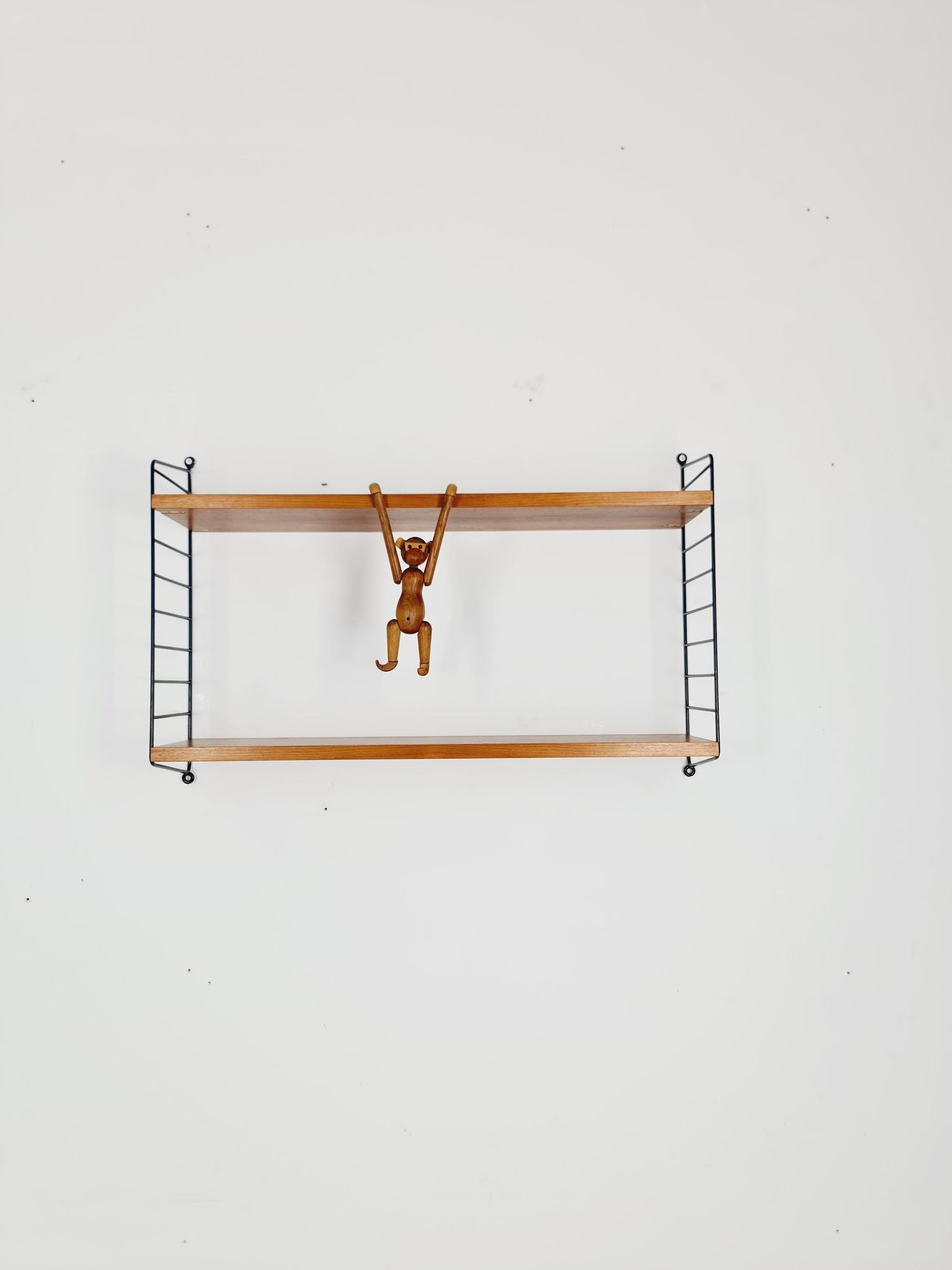 Original MCM Teak shelving system - consists of black lacquered metal ladders, from string Stockholm 1960s