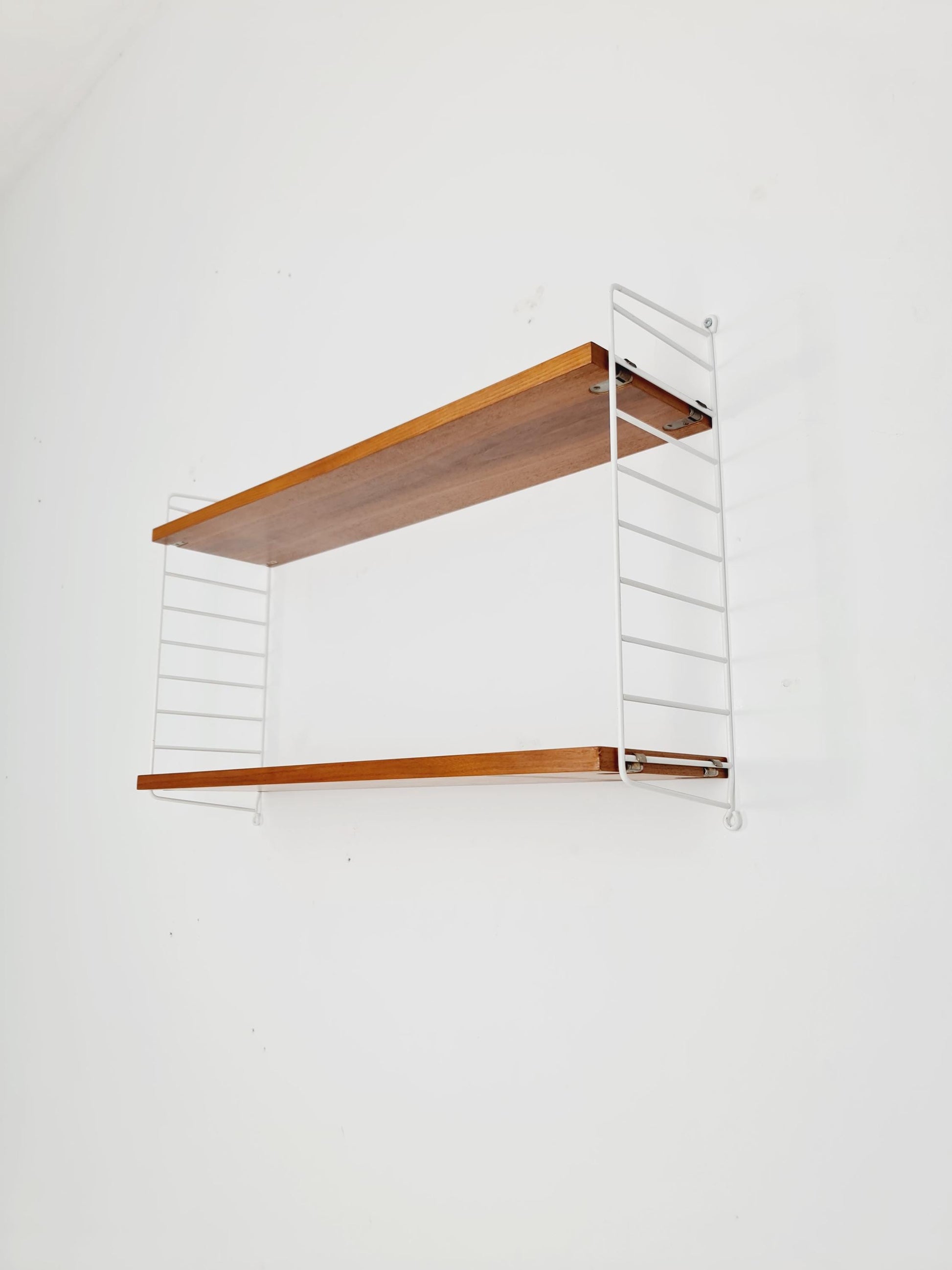 Original MCM Teak shelving system - consists of White lacquered metal ladders, from string Stockholm 1960s