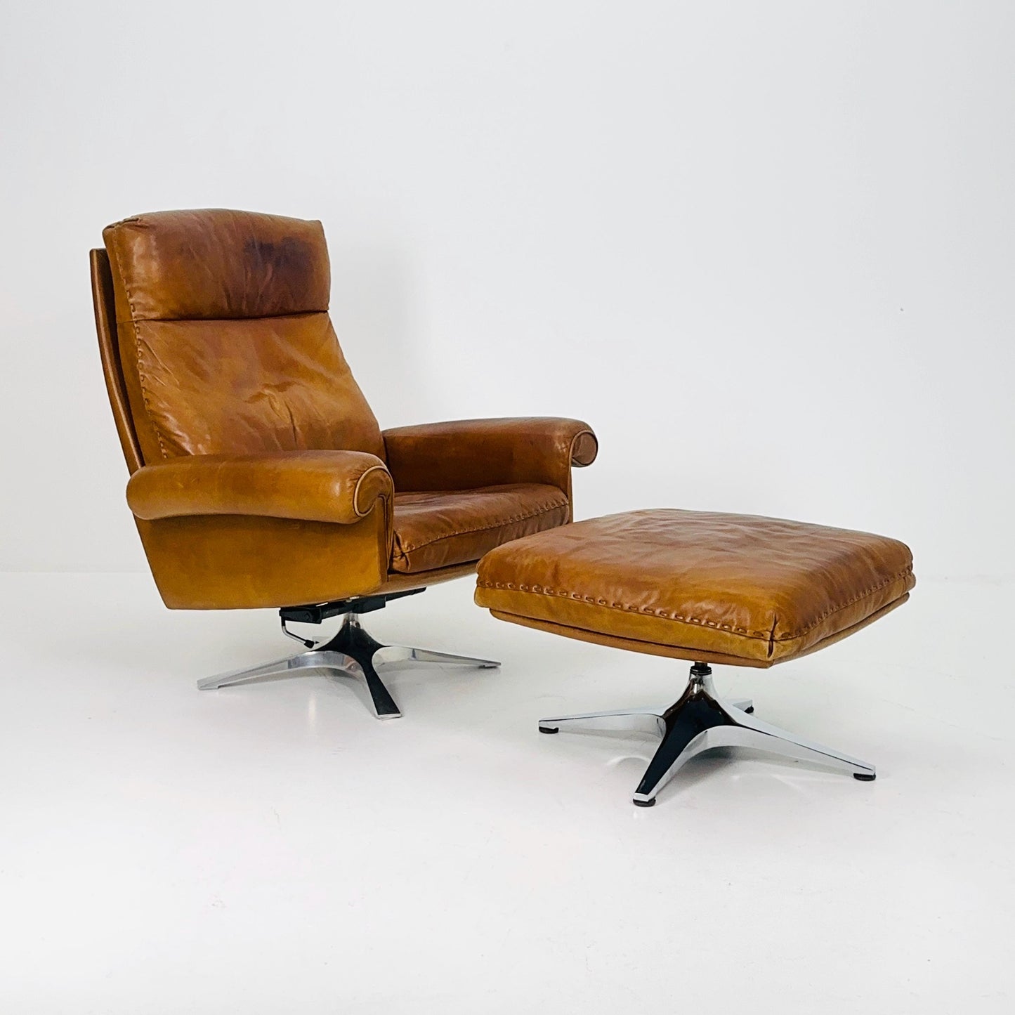 Mid Century De Sede DS31 high back armchair and Ottoman in cognac leather Switzerland 1970s