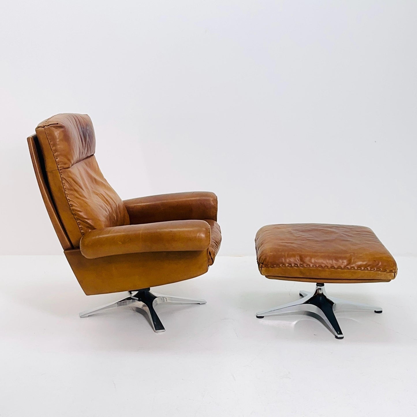 Mid Century De Sede DS31 high back armchair and Ottoman in cognac leather Switzerland 1970s