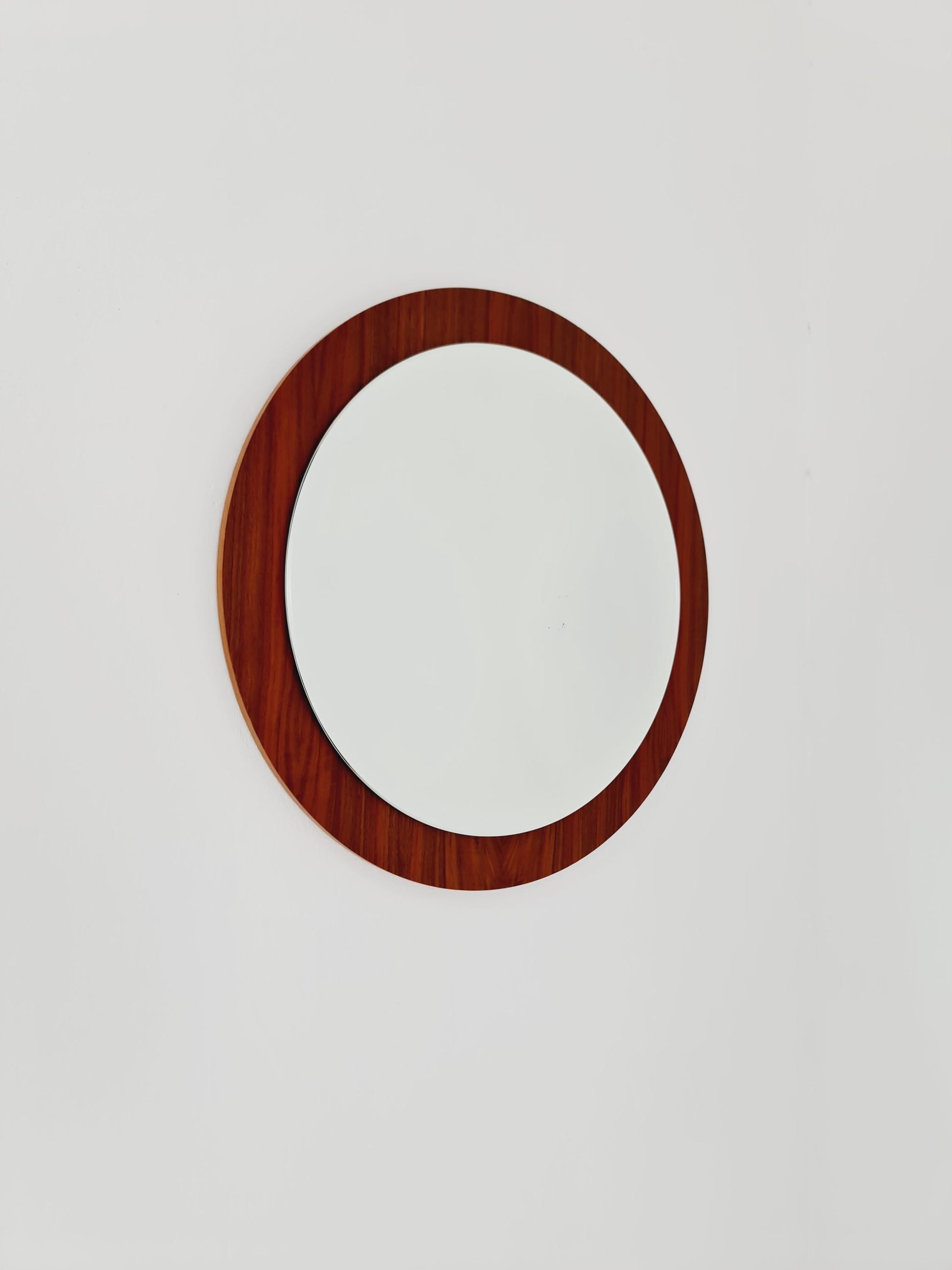 Mid Century round teak wall mirror from the 60s