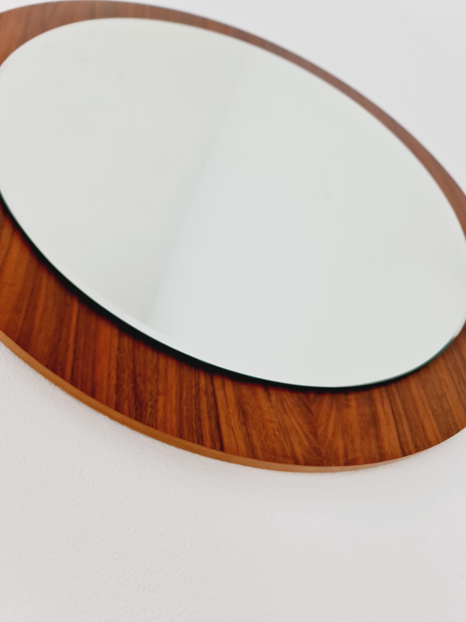 Mid Century round teak wall mirror from the 60s