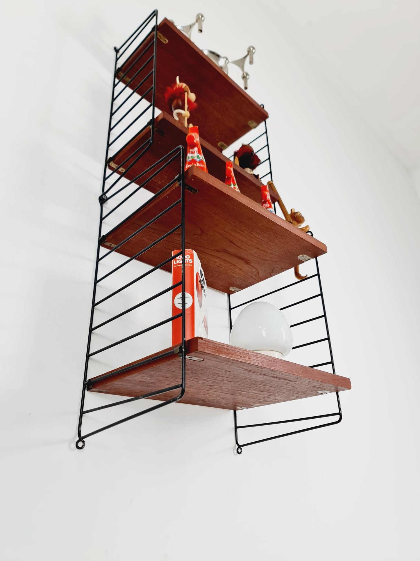 Original MCM Teak shelving system - consists of Black lacquered metal ladders, from string Stockholm 1960s