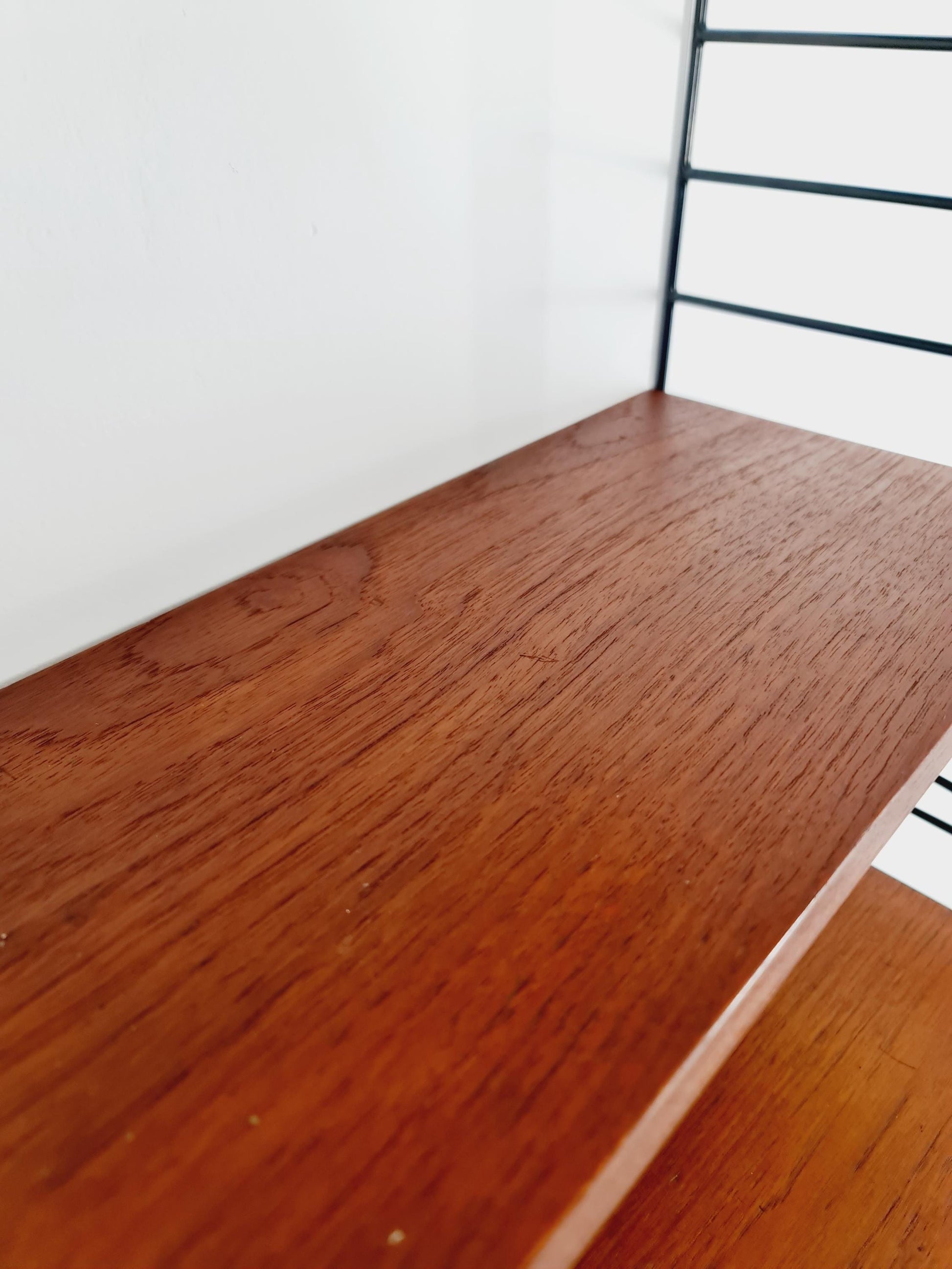 Original MCM Teak shelving system - consists of Black lacquered metal ladders, from string Stockholm 1960s