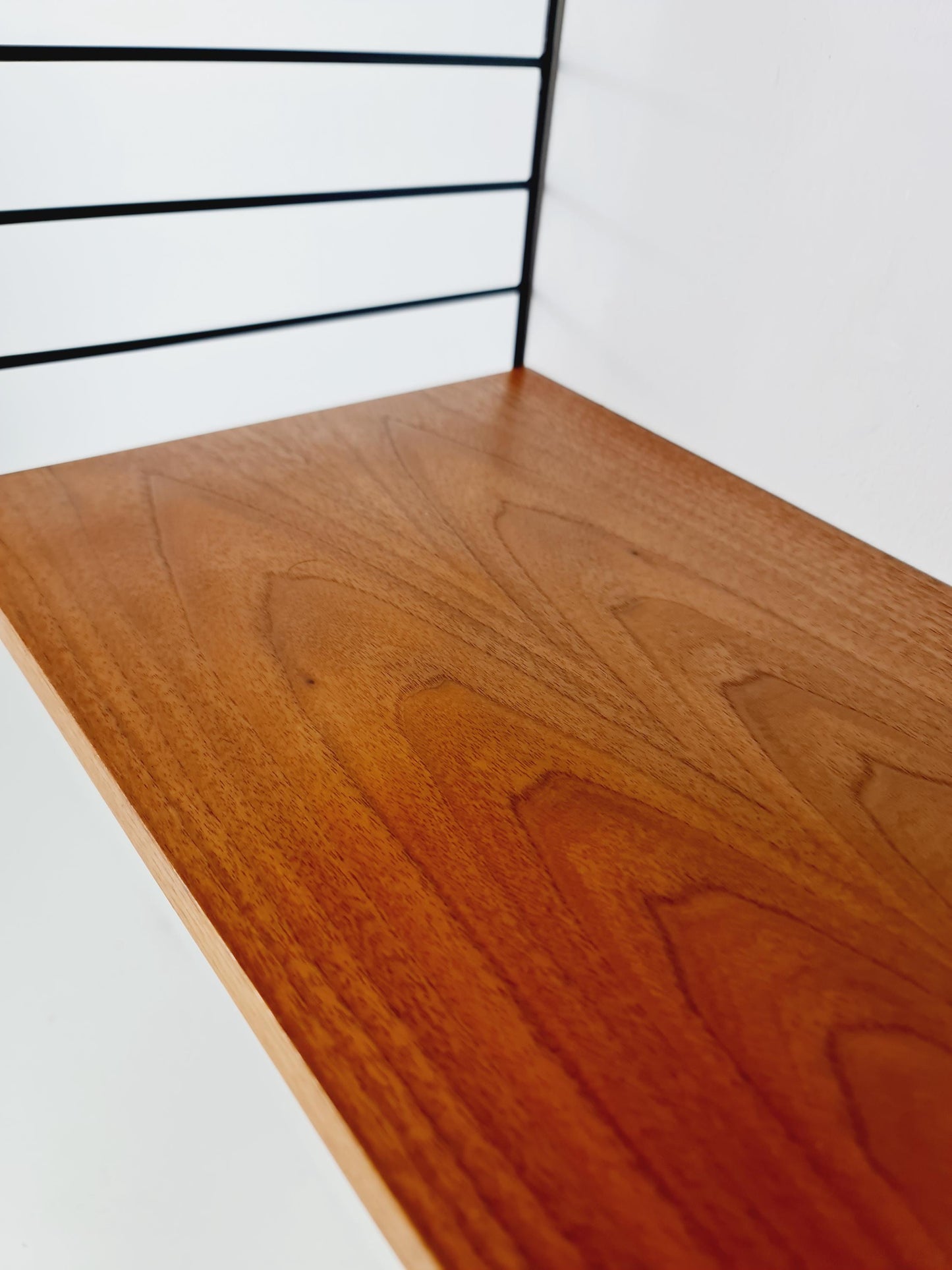 Original MCM Teak shelving system - consists of black lacquered metal ladders, from string Stockholm 1960s