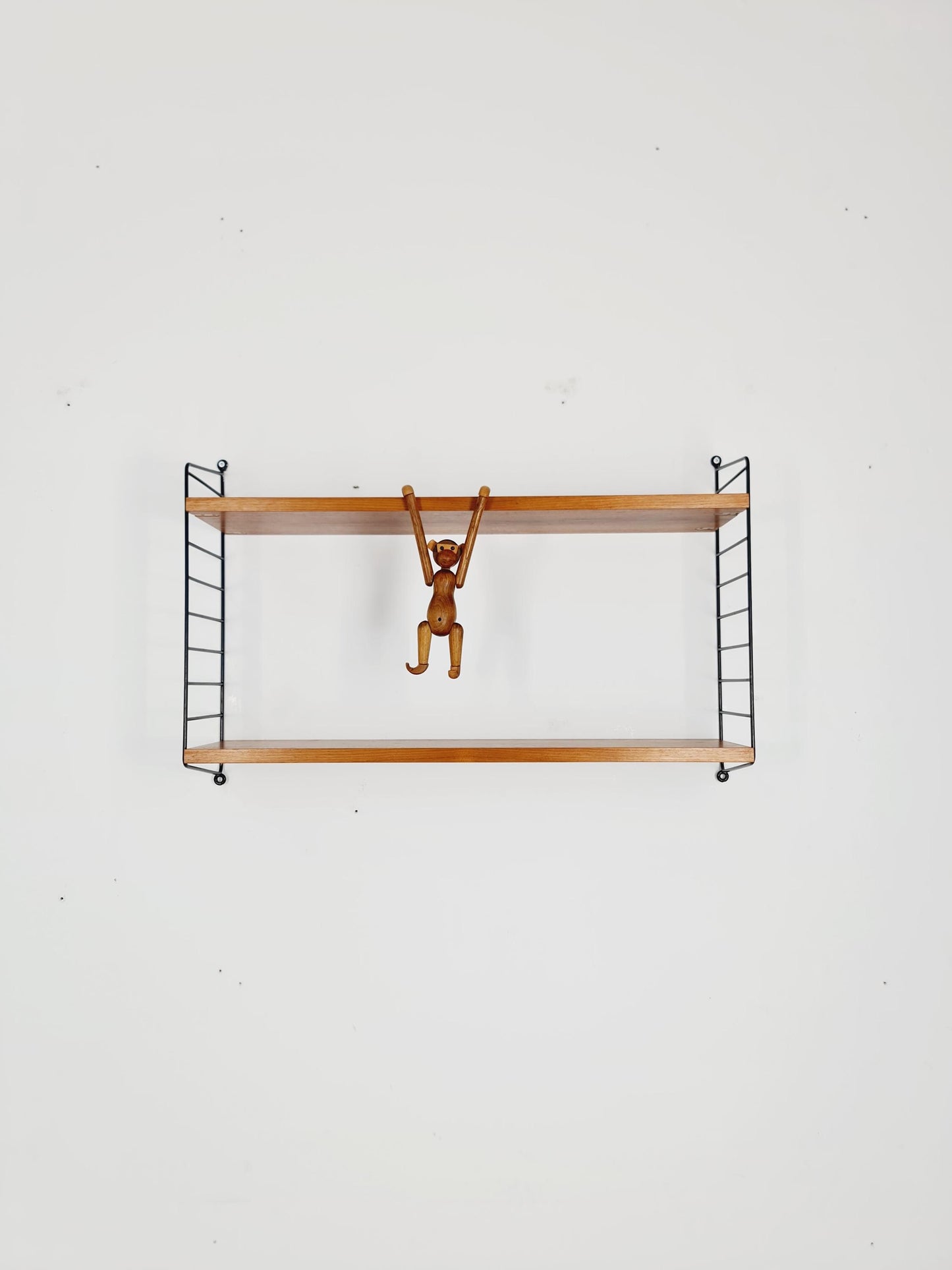 Original MCM Teak shelving system - consists of black lacquered metal ladders, from string Stockholm 1960s
