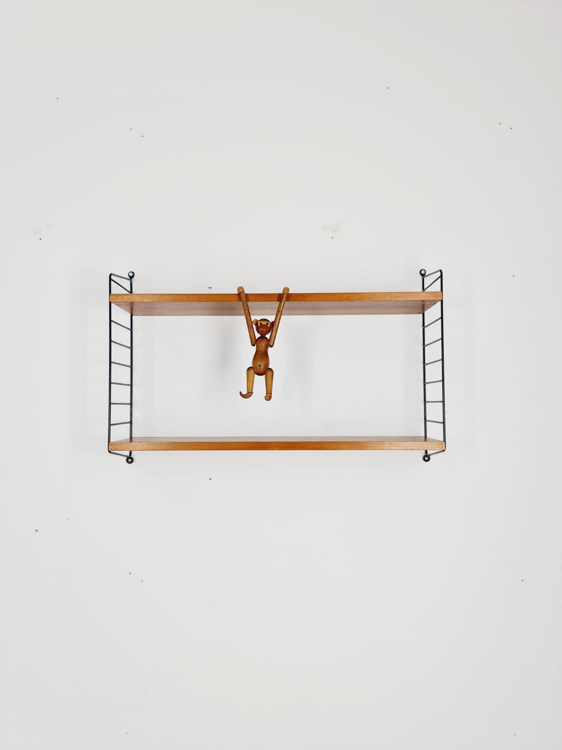 Original MCM Teak shelving system - consists of black lacquered metal ladders, from string Stockholm 1960s