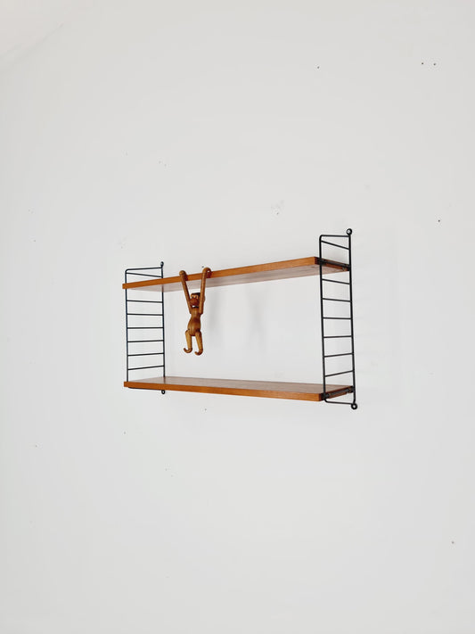 Original MCM Teak shelving system - consists of black lacquered metal ladders, from string Stockholm 1960s