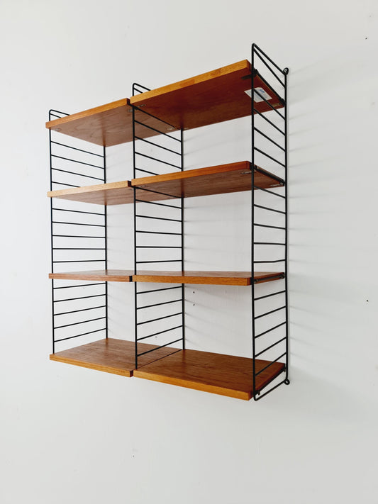 Original MCM Teak shelving system - consists of Black lacquered metal ladders, from string Stockholm 1960s