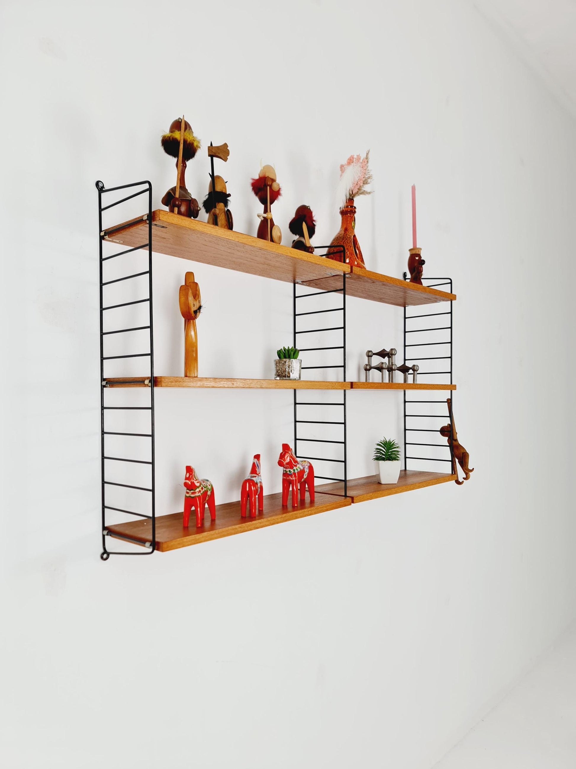 Original MCM Teak shelving system - consists of Black lacquered metal ladders, from string Stockholm 1960s