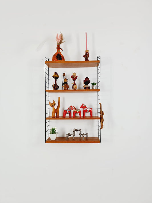 Original MCM Teak shelving system - consists of Black lacquered metal ladders, from string Stockholm 1960s