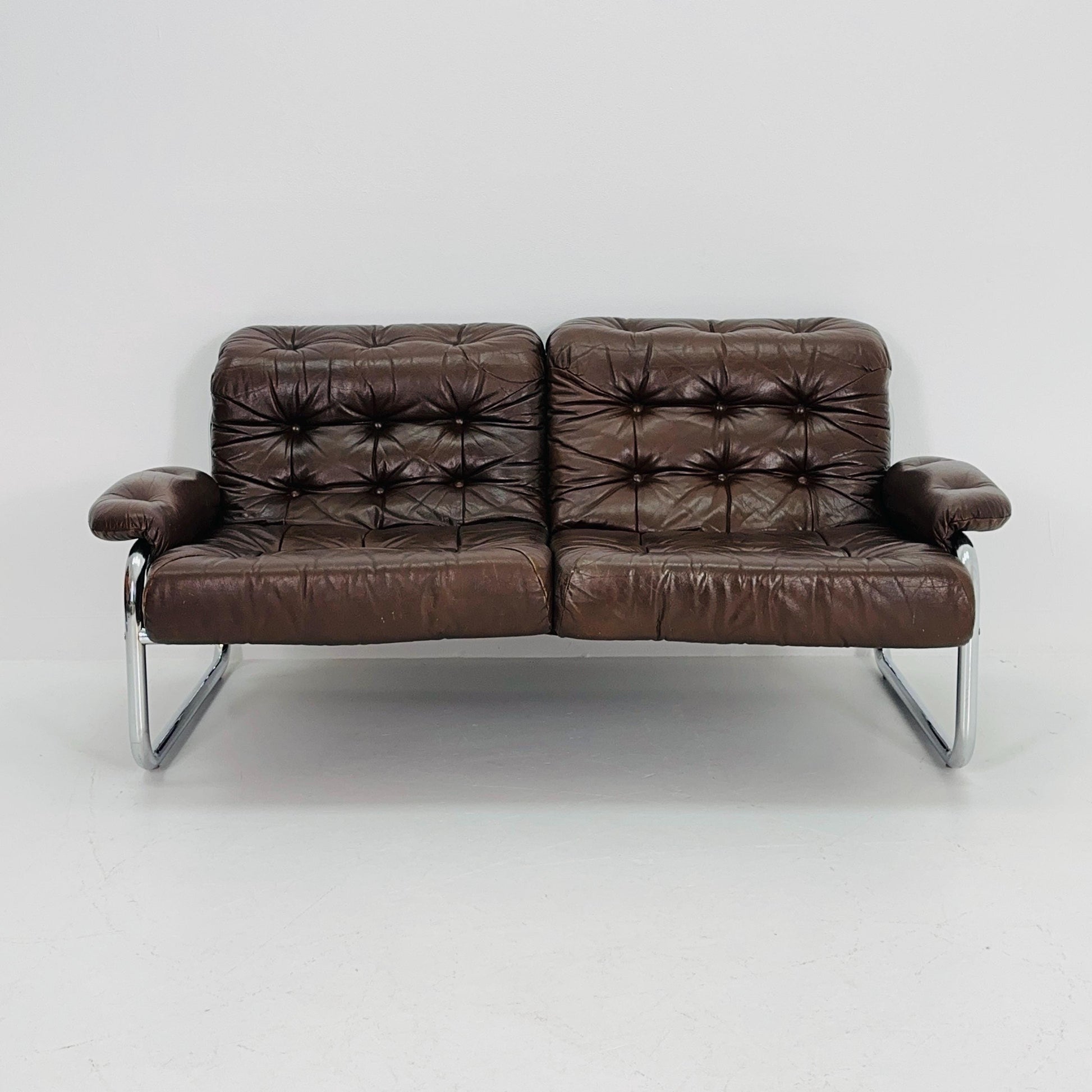 Mid century 2-Seater / tubular frame brown leather sofa "BORKUM" by Johan Bertil Häggström for Ikea 1970s