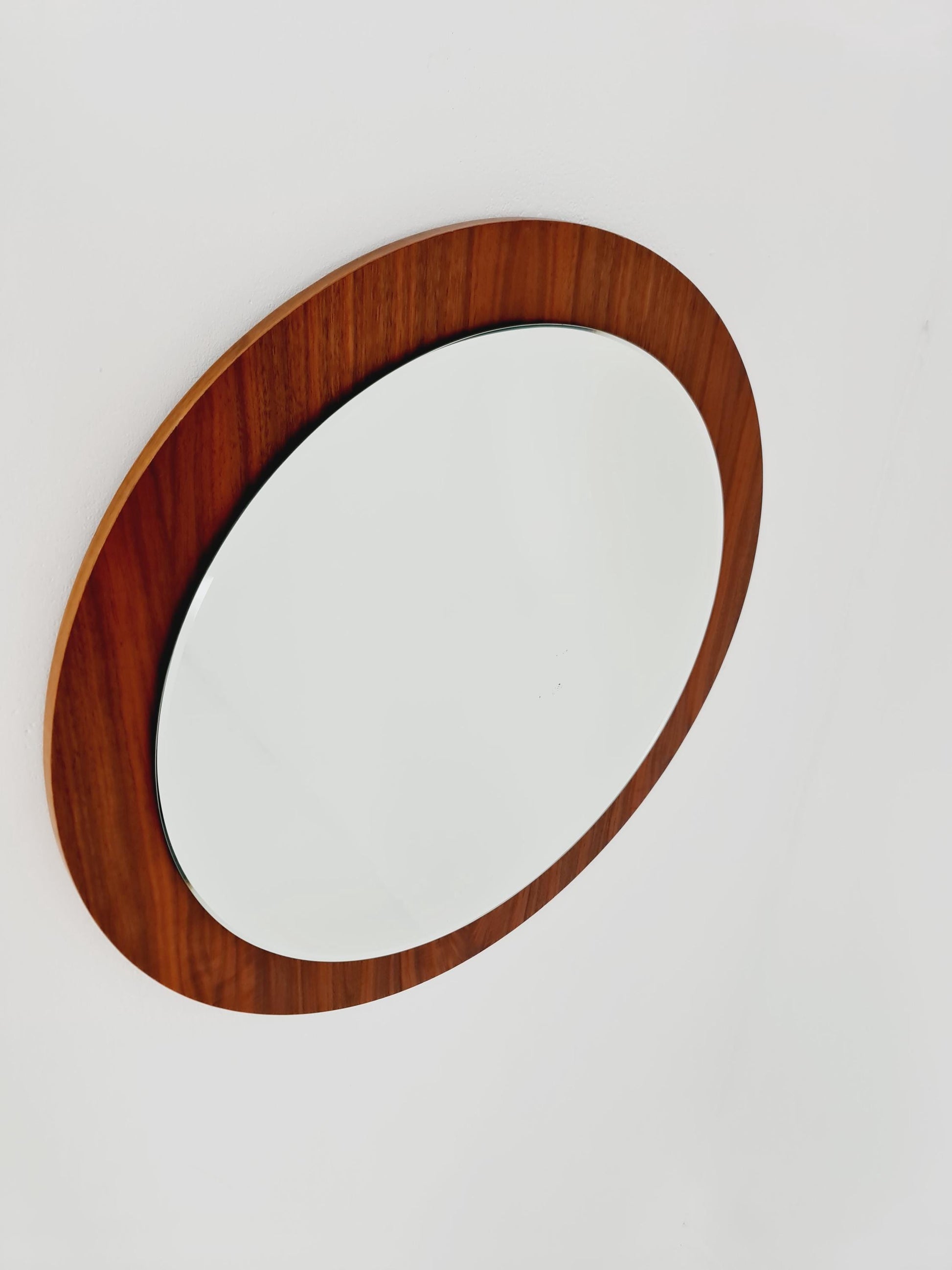 Mid Century round teak wall mirror from the 60s