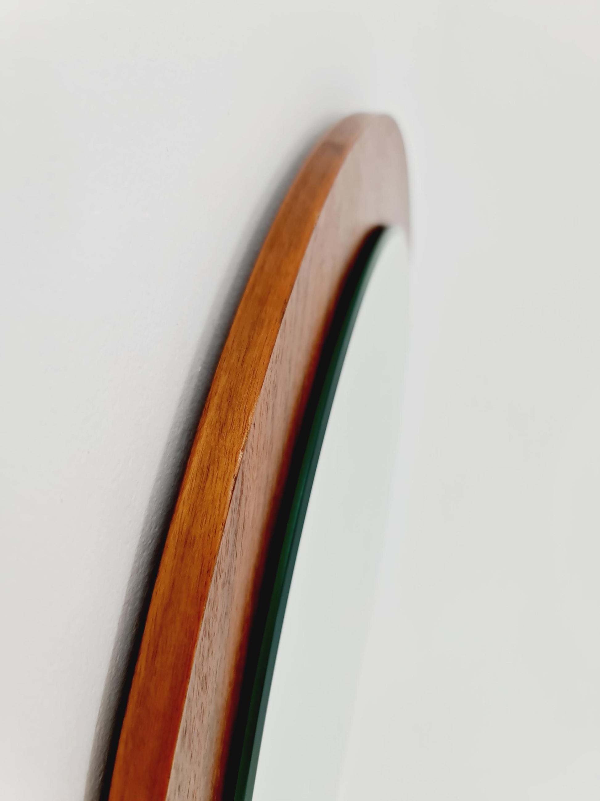 Mid Century round teak wall mirror from the 60s