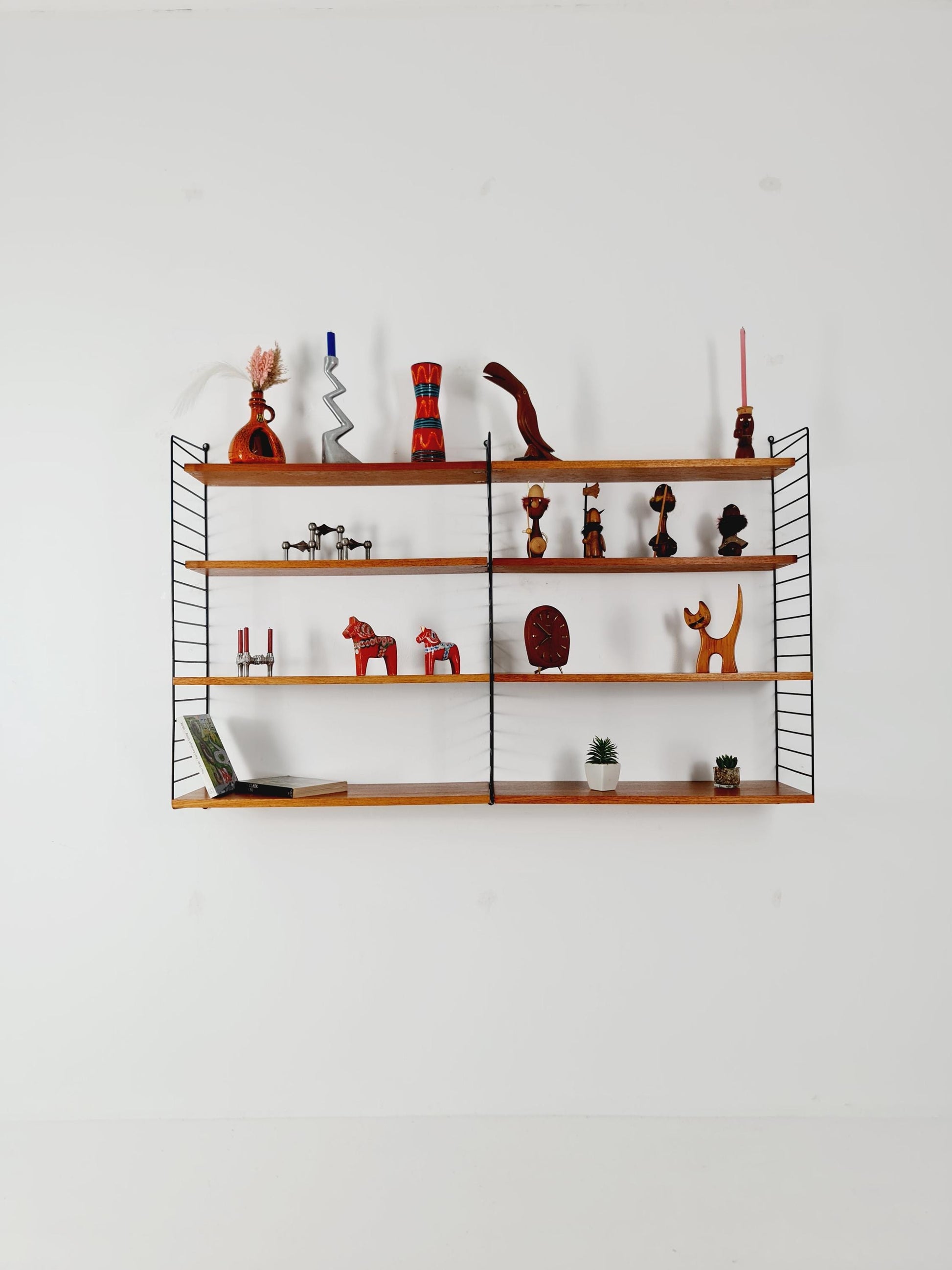 Original MCM Teak shelving system - consists of black lacquered metal ladders, from string Stockholm 1960s