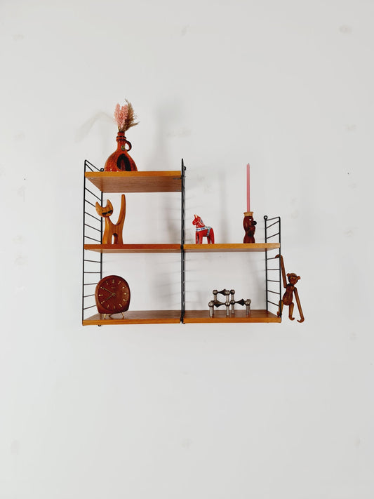 Original MCM Teak shelving system - consists of Black lacquered metal ladders, from string Stockholm 1960s
