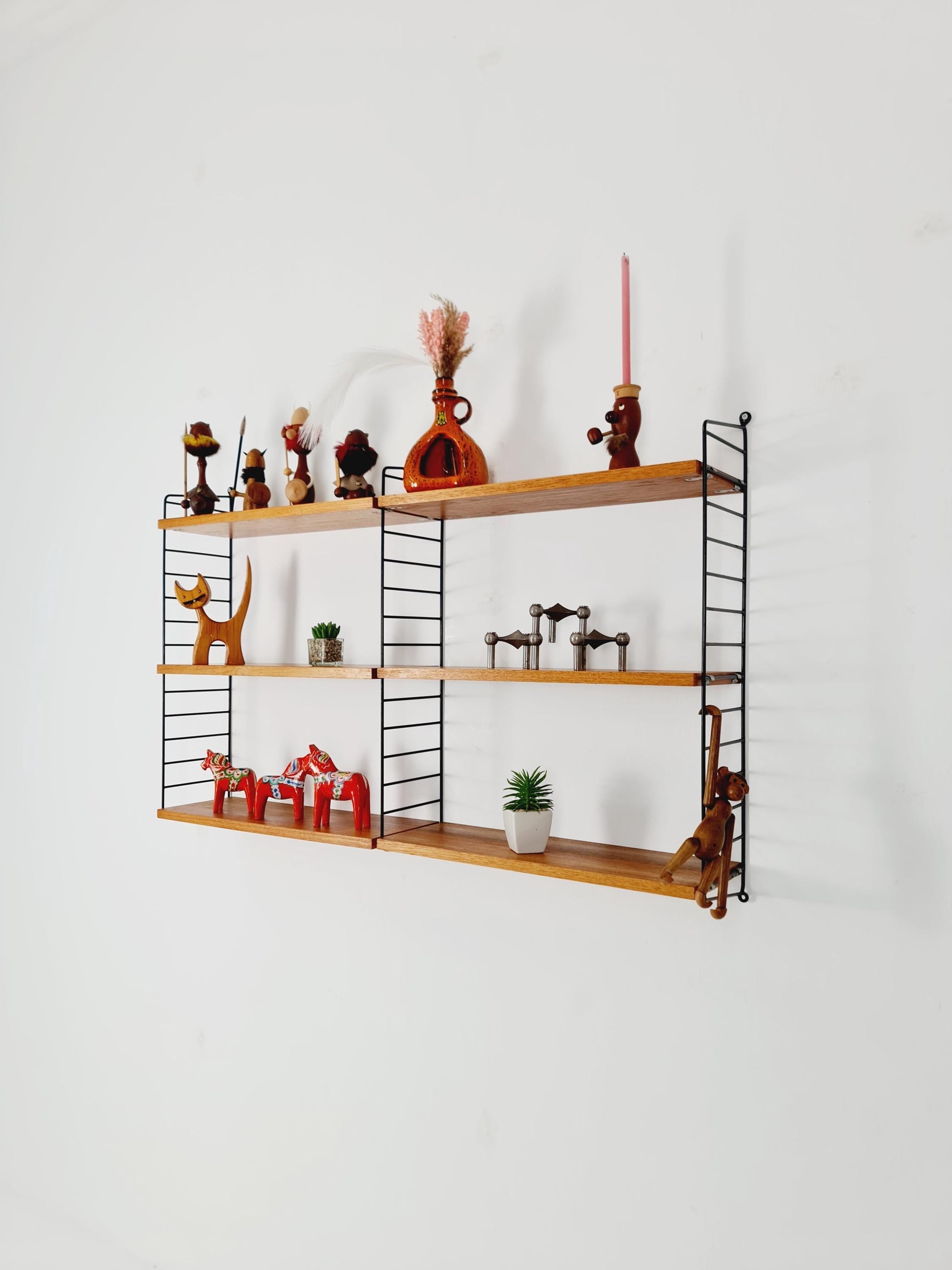 Original MCM Teak shelving system - consists of Black lacquered metal ladders, from string Stockholm 1960s