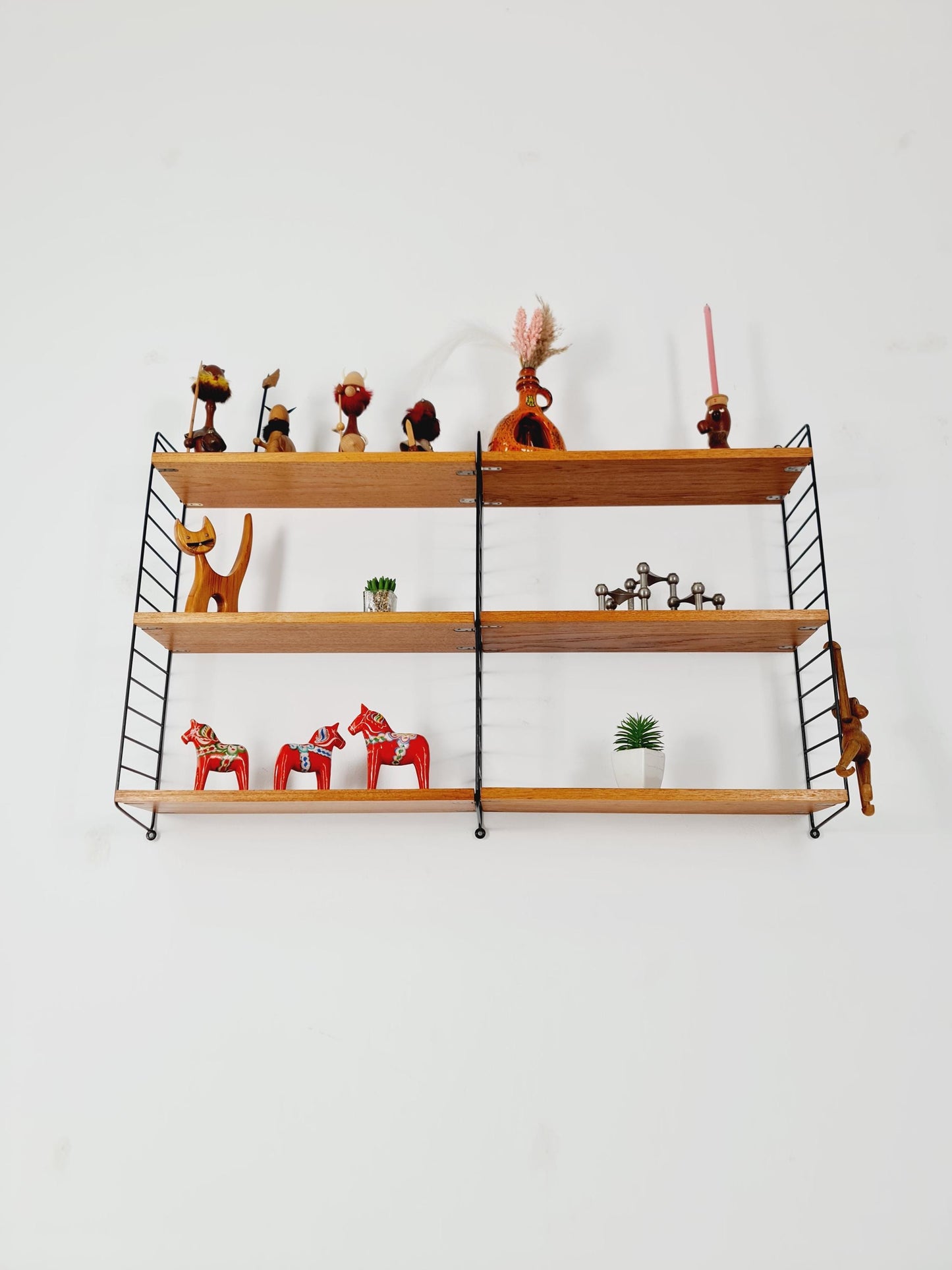 Original MCM Teak shelving system - consists of Black lacquered metal ladders, from string Stockholm 1960s
