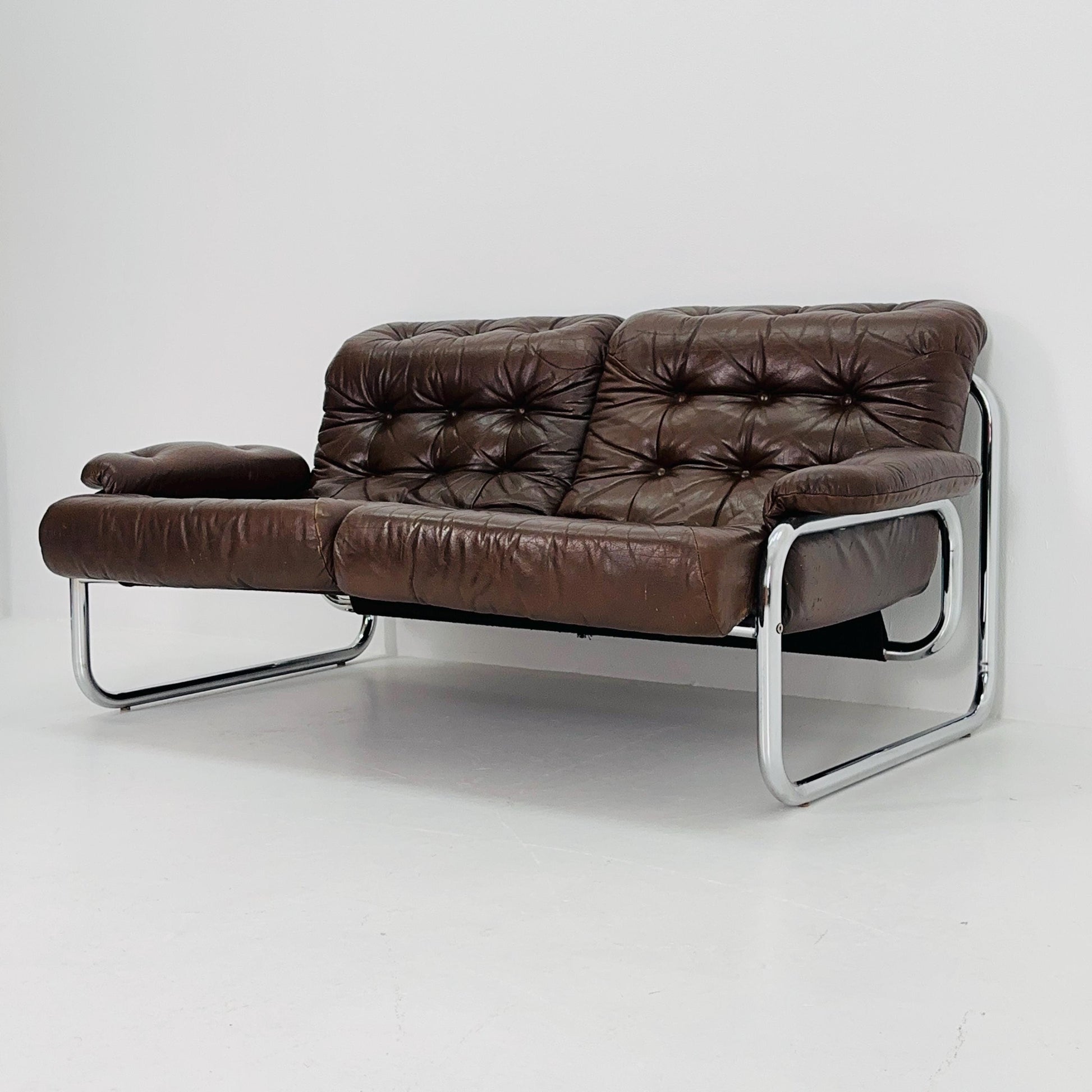 Mid century 2-Seater / tubular frame brown leather sofa "BORKUM" by Johan Bertil Häggström for Ikea 1970s