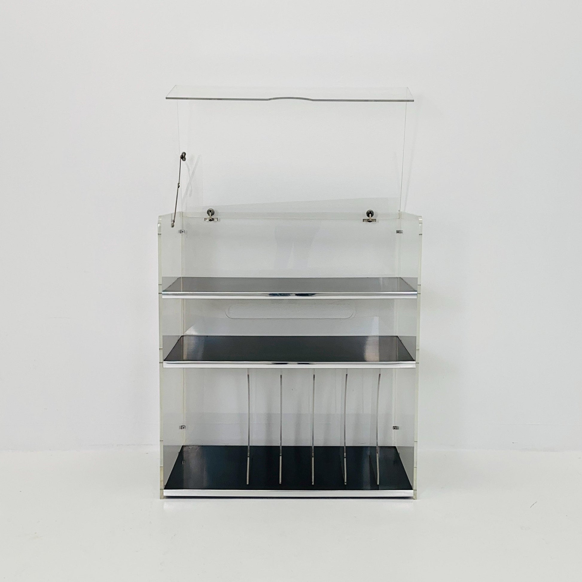 Space age Plexiglass vinyl storage /stand by Michel Dumas for Roche Bobois 1970s