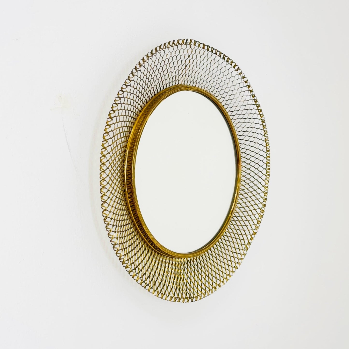 Mid-century wall mirror by Josef Frank Svenskt Tenn, Austria, Sweden, brass, 1950s