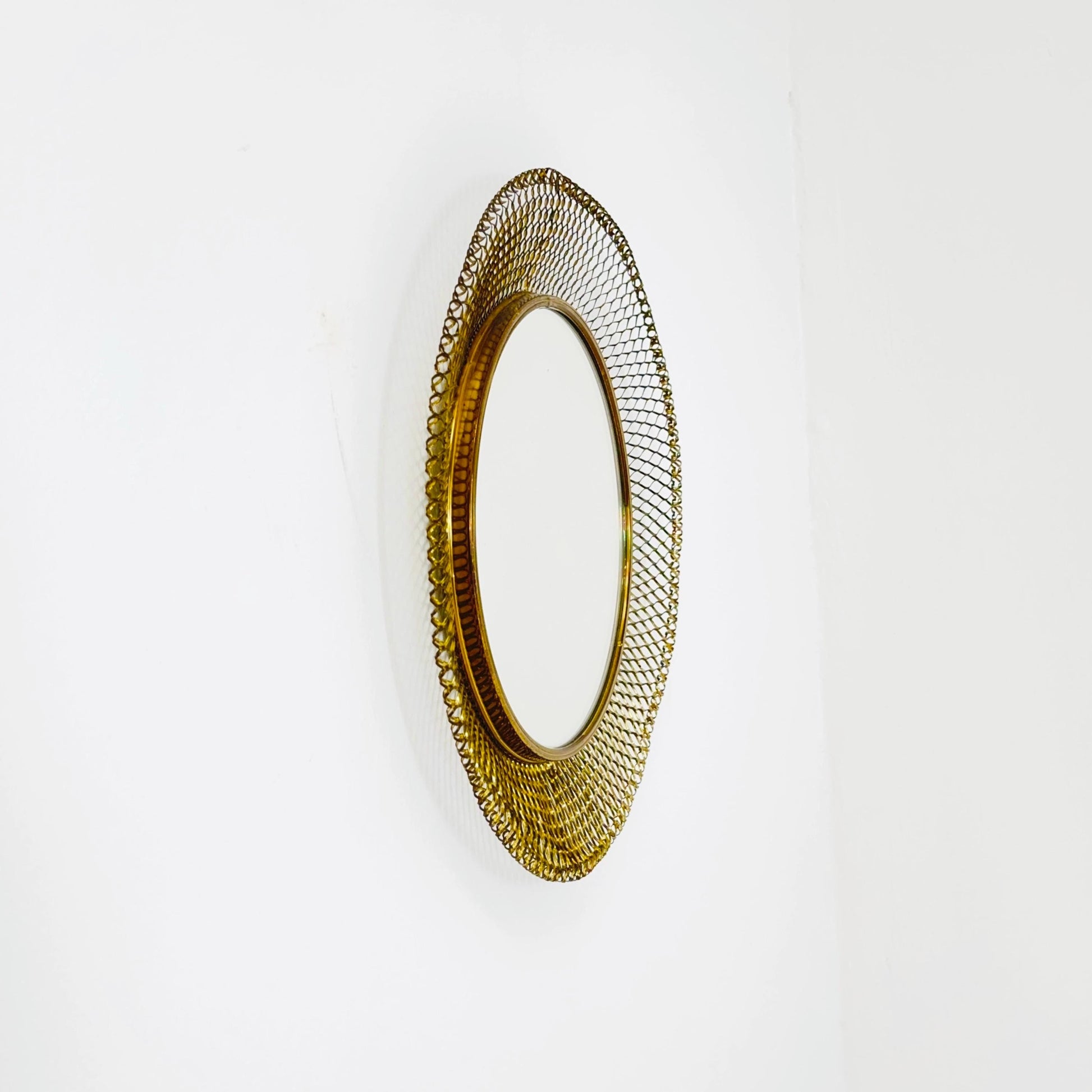 Mid-century wall mirror by Josef Frank Svenskt Tenn, Austria, Sweden, brass, 1950s