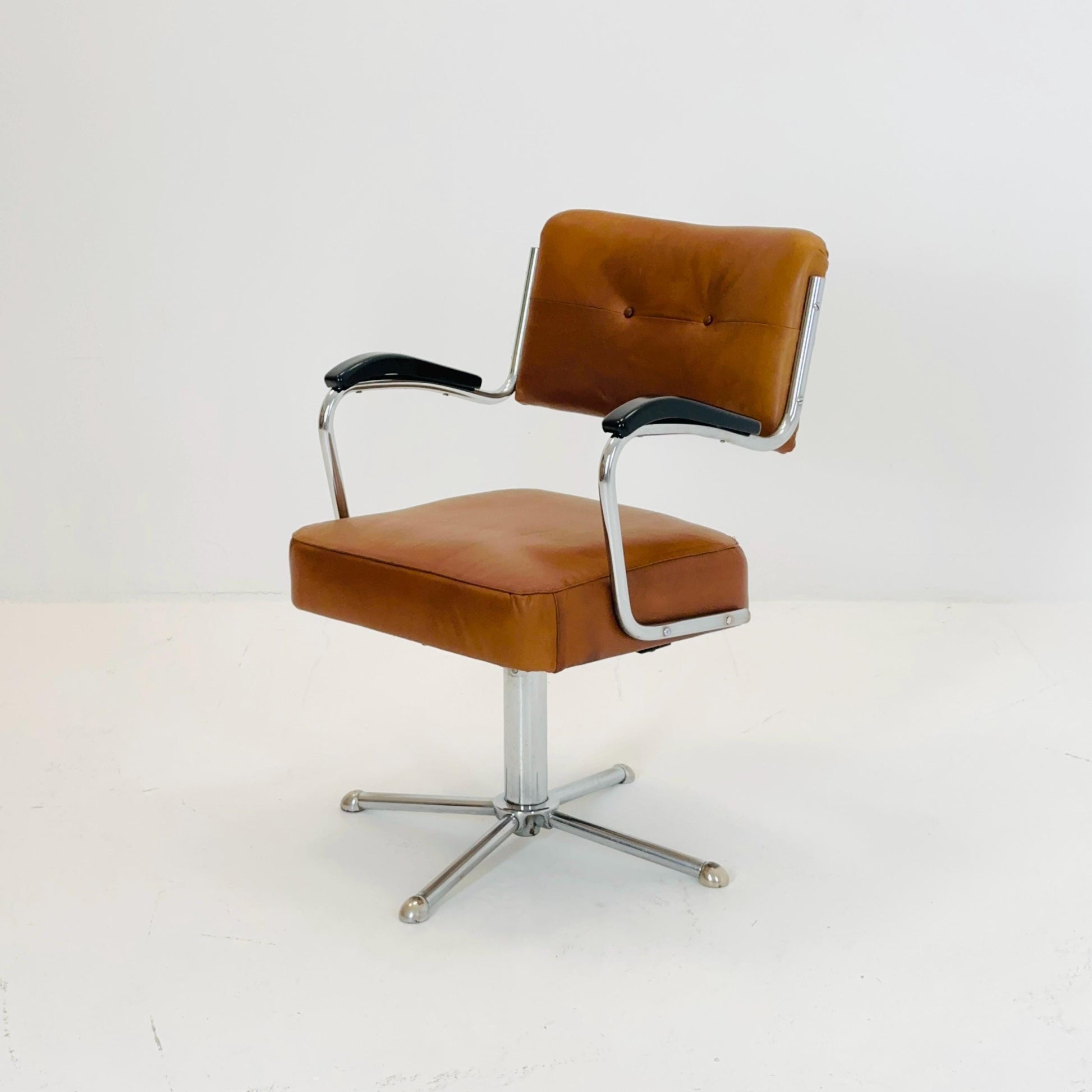 Mid century cognac leather swivel desk armchair 1980s Germany