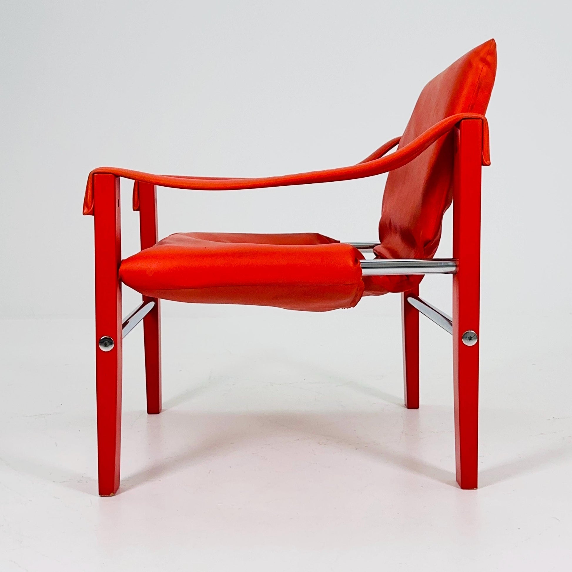 Mid century Red leather Safari armchairs from Arkana by Maurice Burke, United Kingdom 1970s Scotland