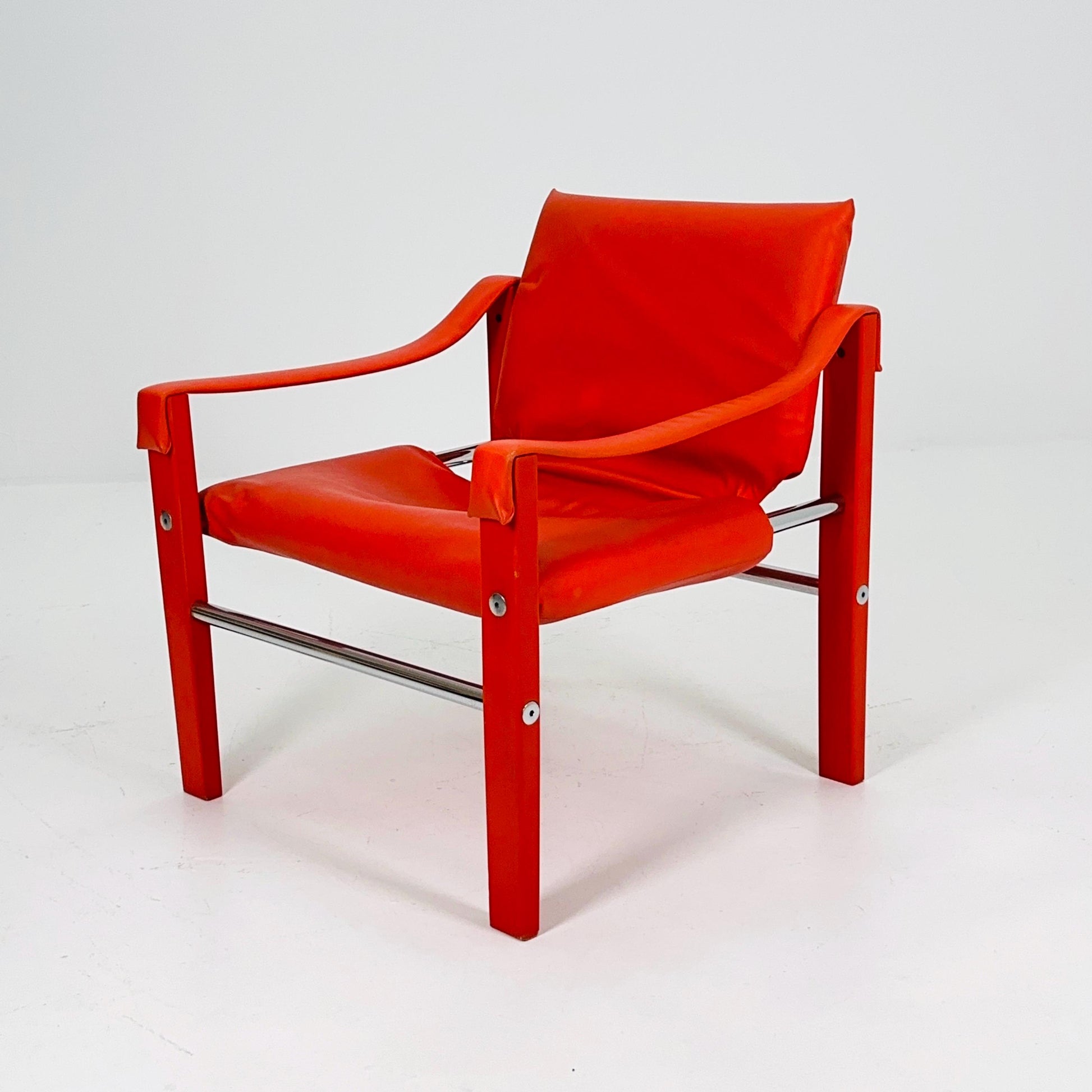 Mid century Red leather Safari armchairs from Arkana by Maurice Burke, United Kingdom 1970s Scotland