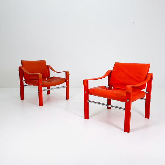 Set of 2 Mid century Red leather Safari armchairs from Arkana by Maurice Burke, United Kingdom 1970s Scotland