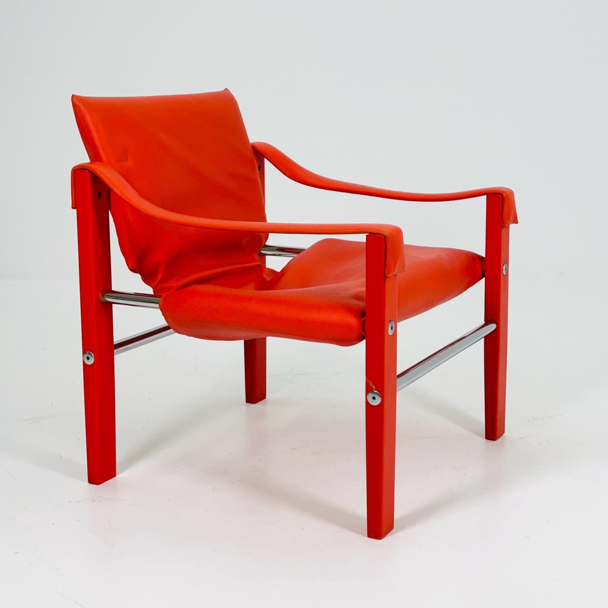 Set of 2 Mid century Red leather Safari armchairs from Arkana by Maurice Burke, United Kingdom 1970s Scotland