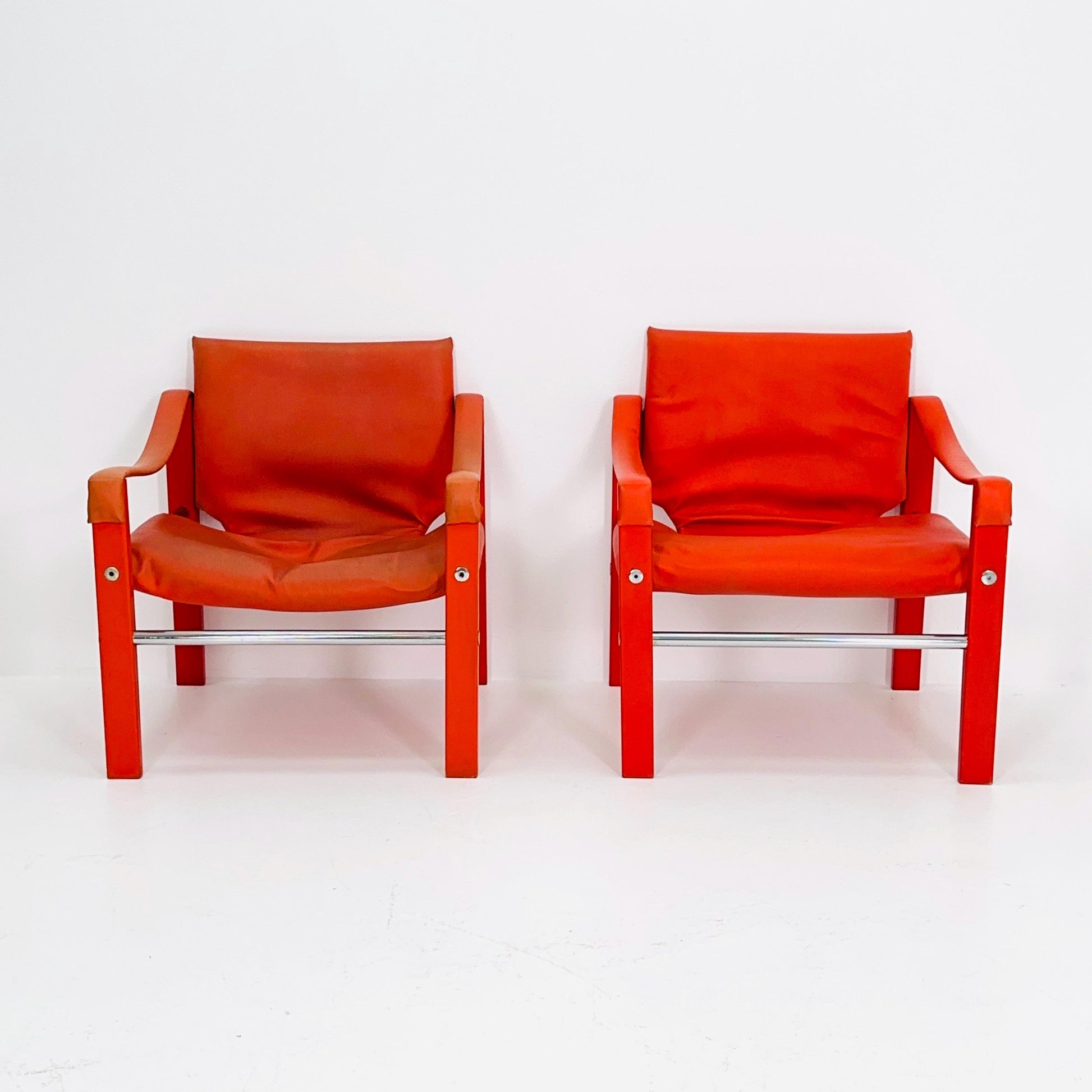 Set of 2 Mid century Red leather Safari armchairs from Arkana by Maurice Burke, United Kingdom 1970s Scotland