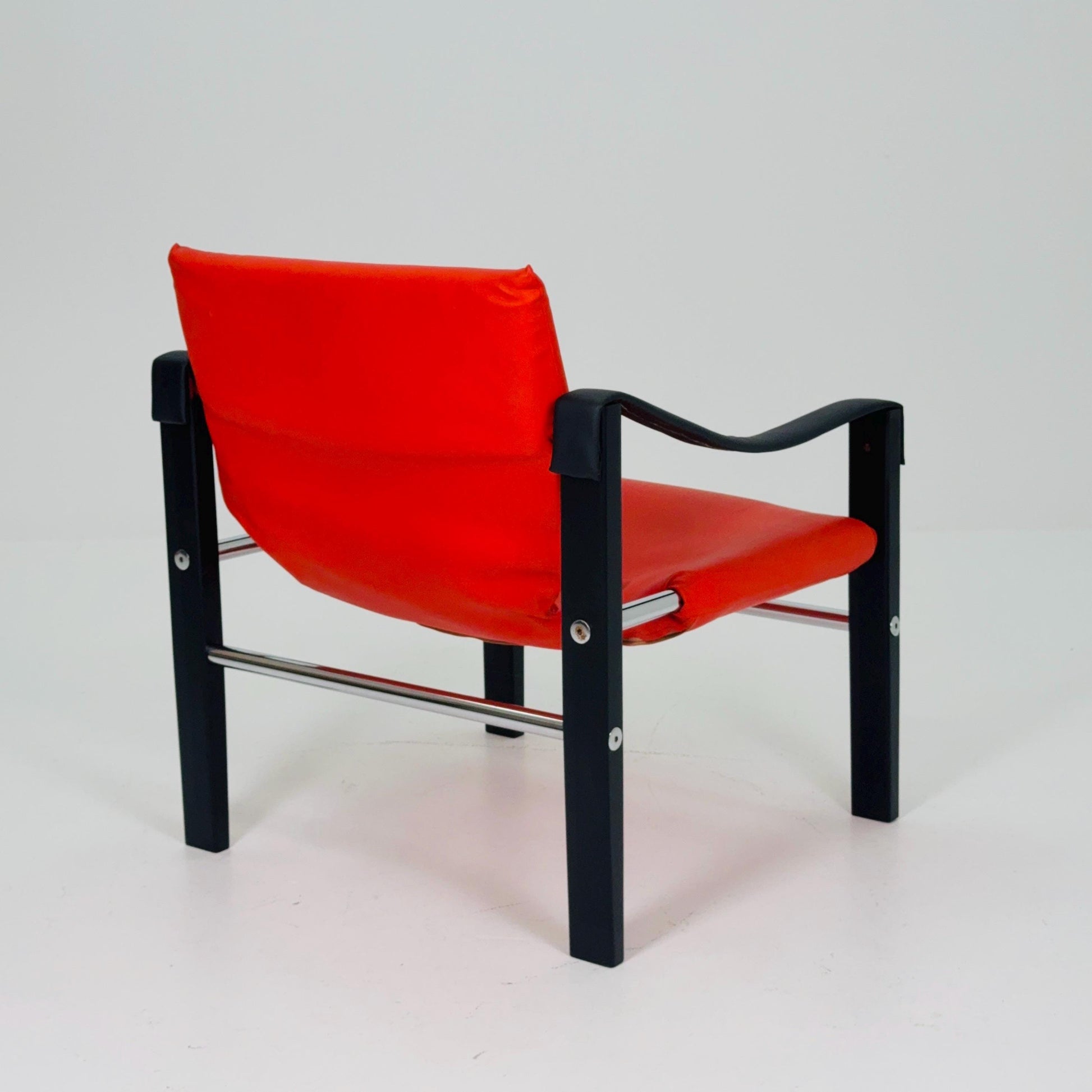 Mid century Red leather Safari armchairs from Arkana by Maurice Burke, United Kingdom 1970s Scotland