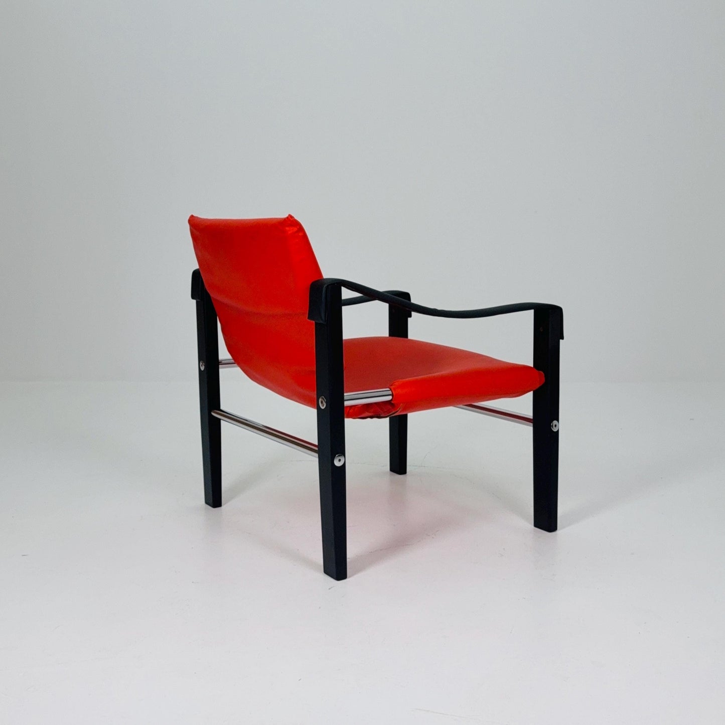 Mid century Red leather Safari armchairs from Arkana by Maurice Burke, United Kingdom 1970s Scotland