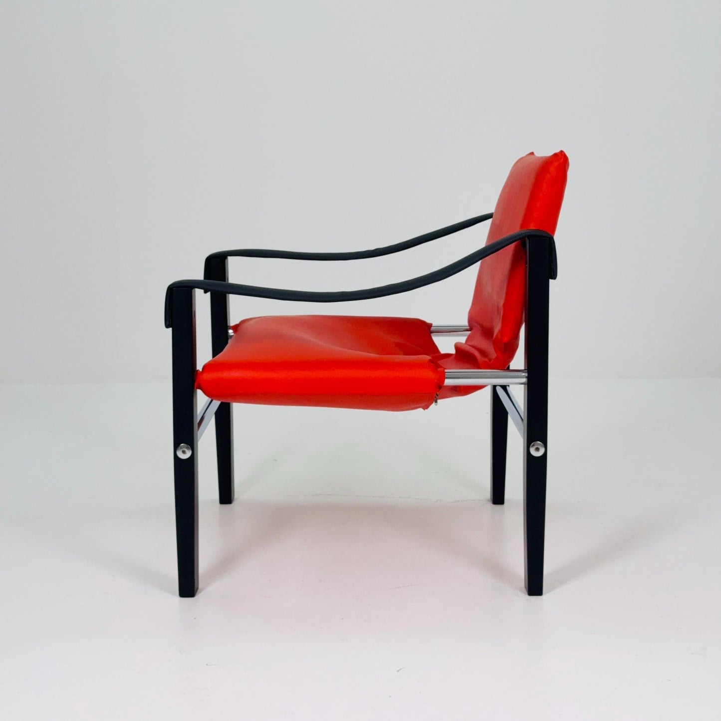 Mid century Red leather Safari armchairs from Arkana by Maurice Burke, United Kingdom 1970s Scotland