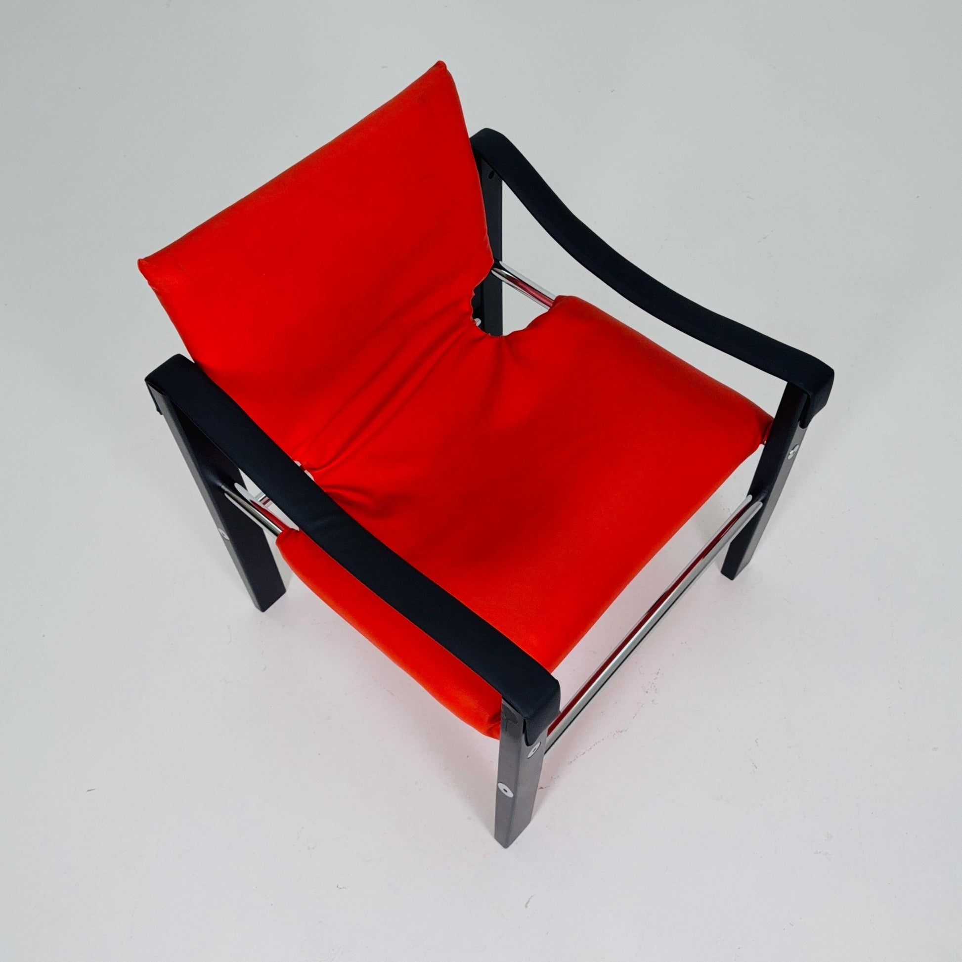 Mid century Red leather Safari armchairs from Arkana by Maurice Burke, United Kingdom 1970s Scotland