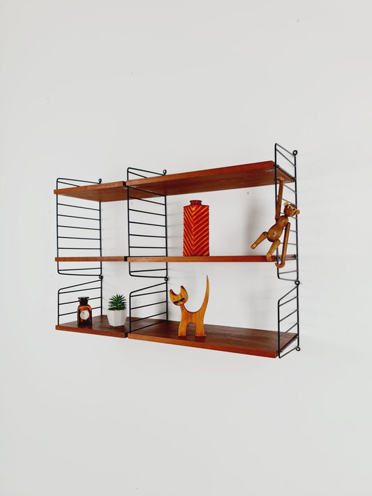 Original MCM Teak shelving system - consists of Black lacquered metal ladders, from string Stockholm 1960s