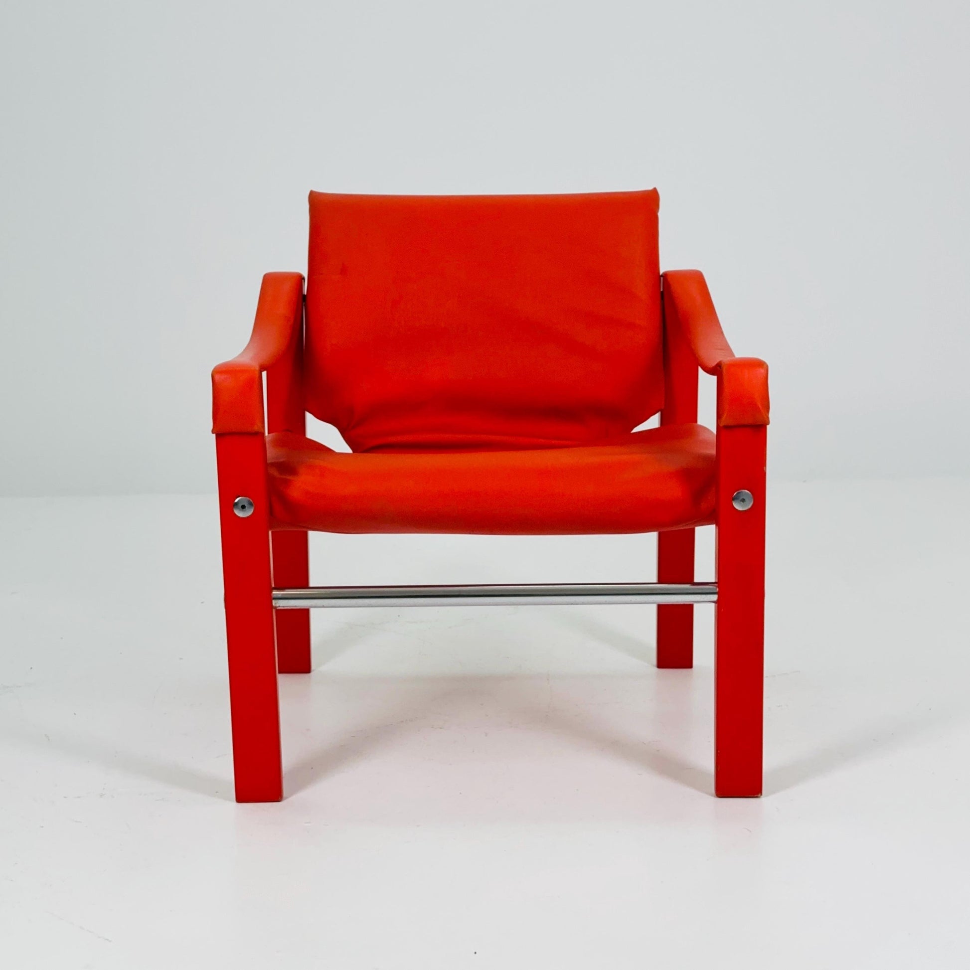Mid century Red leather Safari armchairs from Arkana by Maurice Burke, United Kingdom 1970s Scotland
