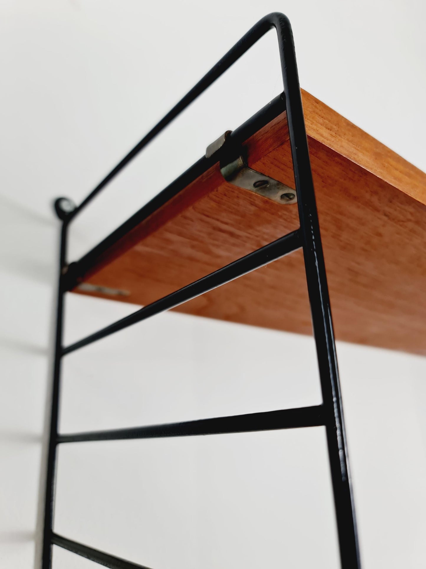 Original MCM Teak shelving system - consists of black lacquered metal ladders, from string Stockholm 1960s