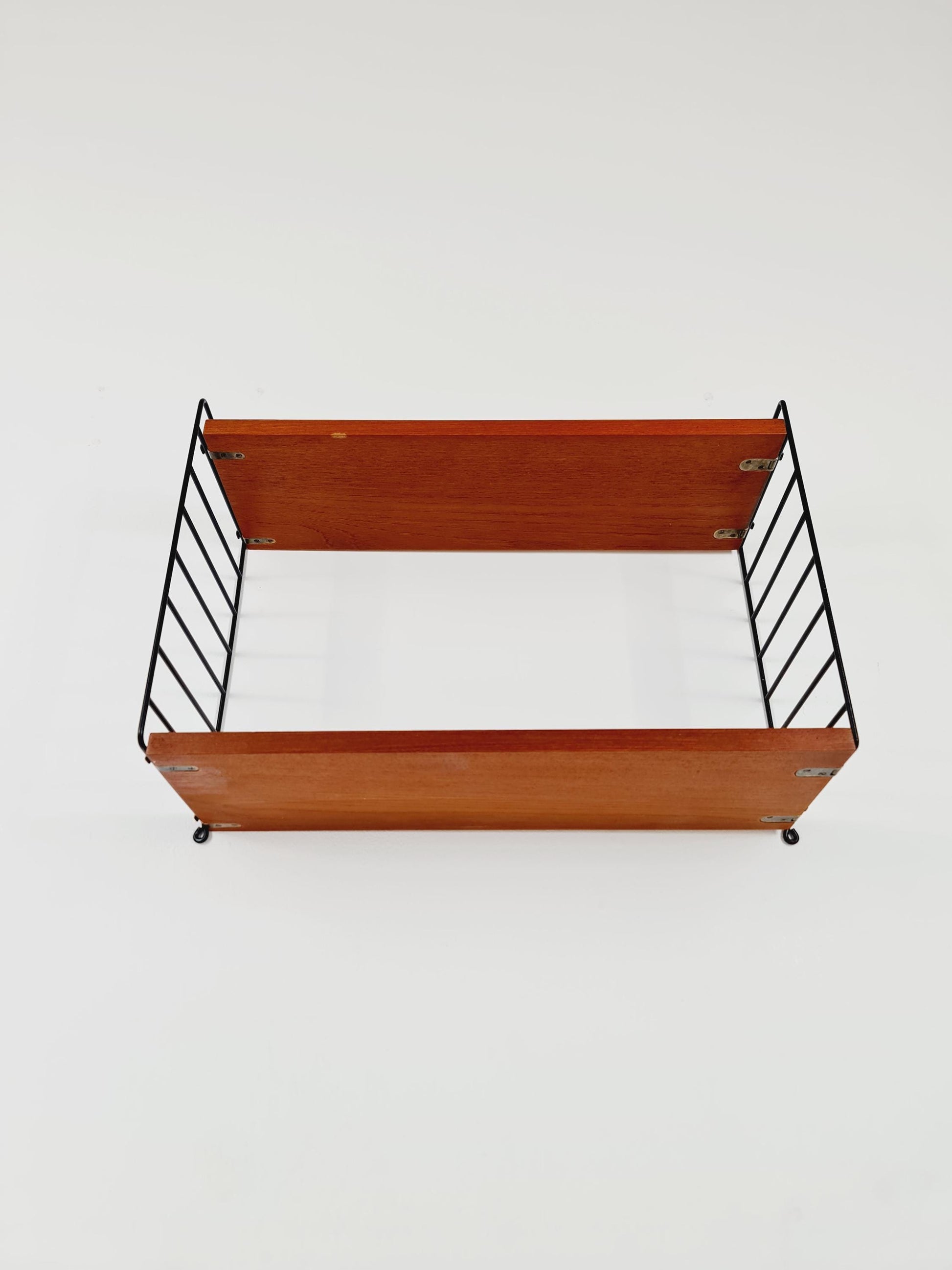Original MCM Teak shelving system - consists of black lacquered metal ladders, from string Stockholm 1960s