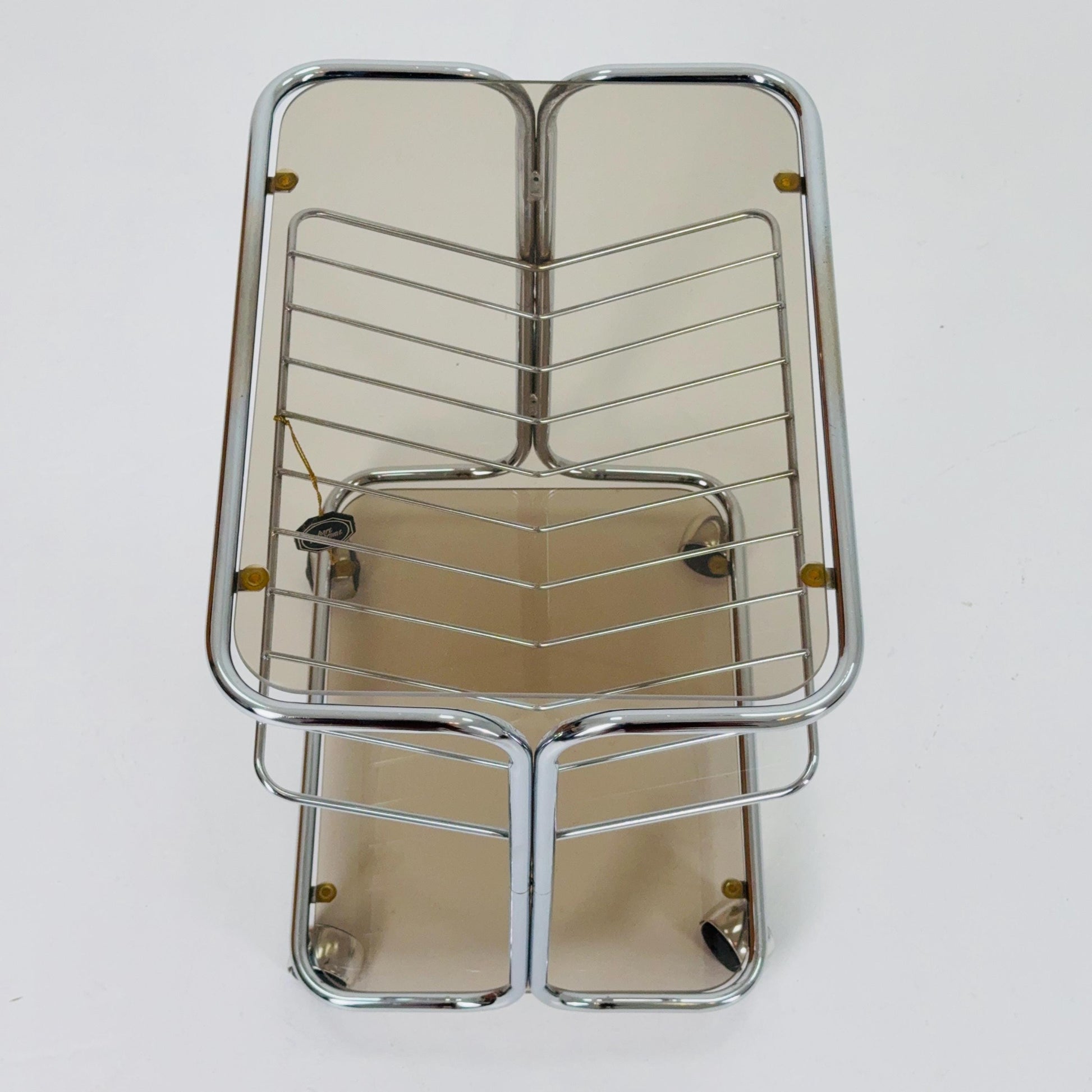 Mid century Chrome bar cart/serving trolley. magazine rack Smoked glass ,Bauhaus Germany 1980s