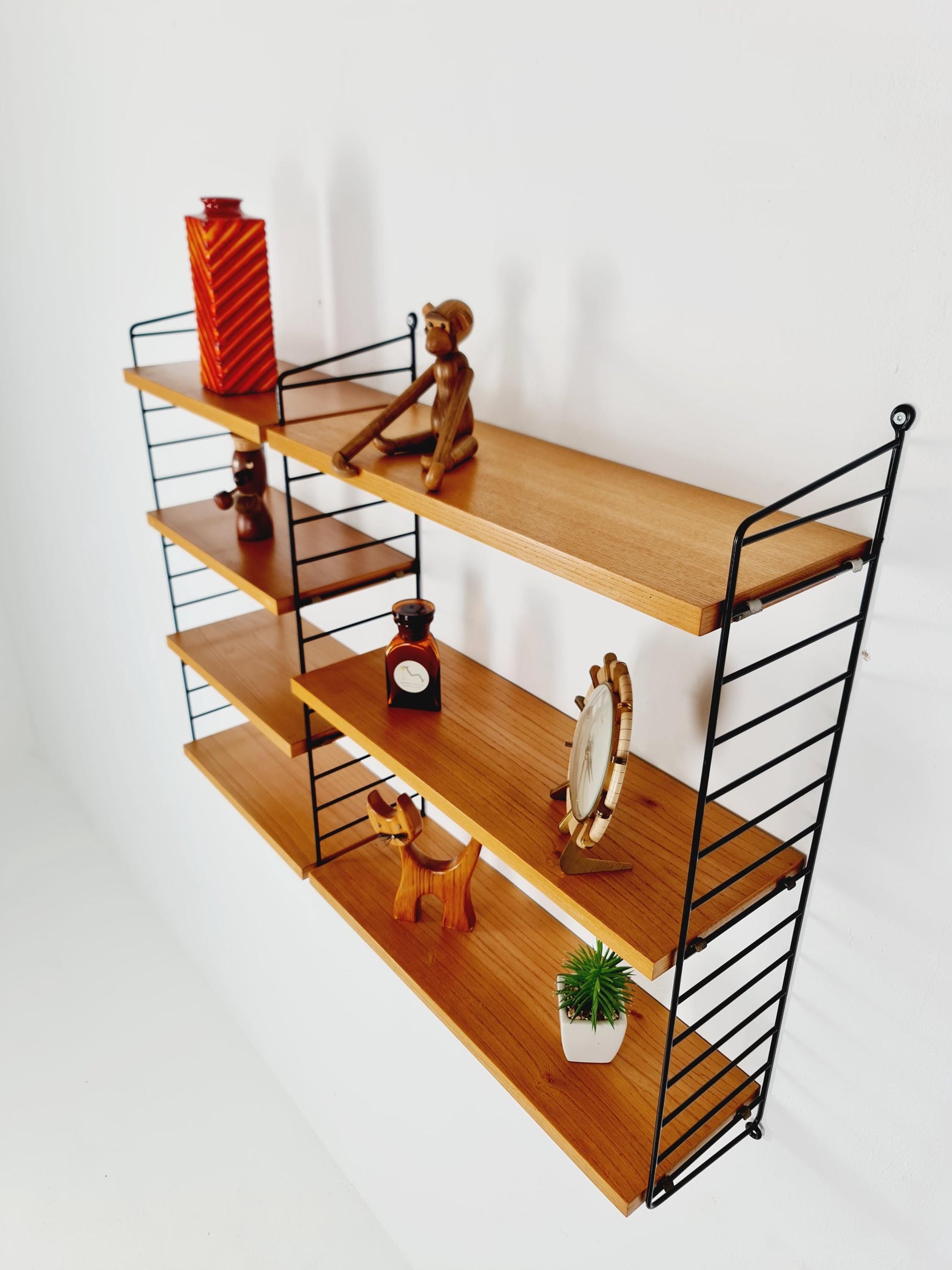 Original MCM Ash wood shelving system - consists of Black lacquered metal ladders, from string Stockholm 1960s