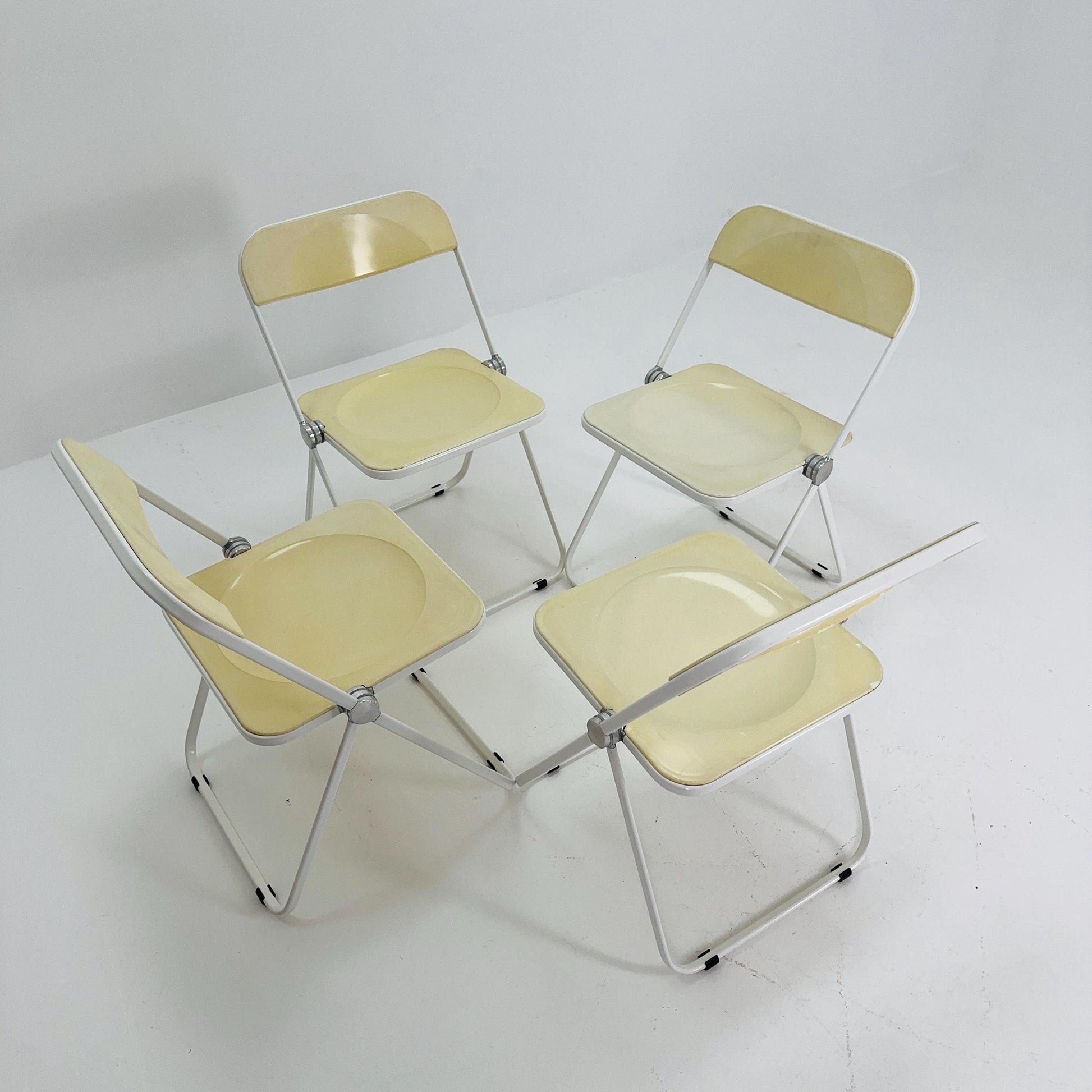 Set of 4 Mid century Italian Plia Folding cream white Chair by Giancarlo Piretti for Castelli, 1970s