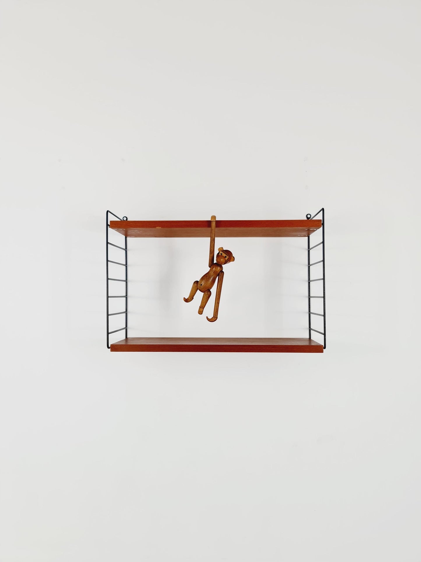 Original MCM Teak shelving system - consists of black lacquered metal ladders, from string Stockholm 1960s