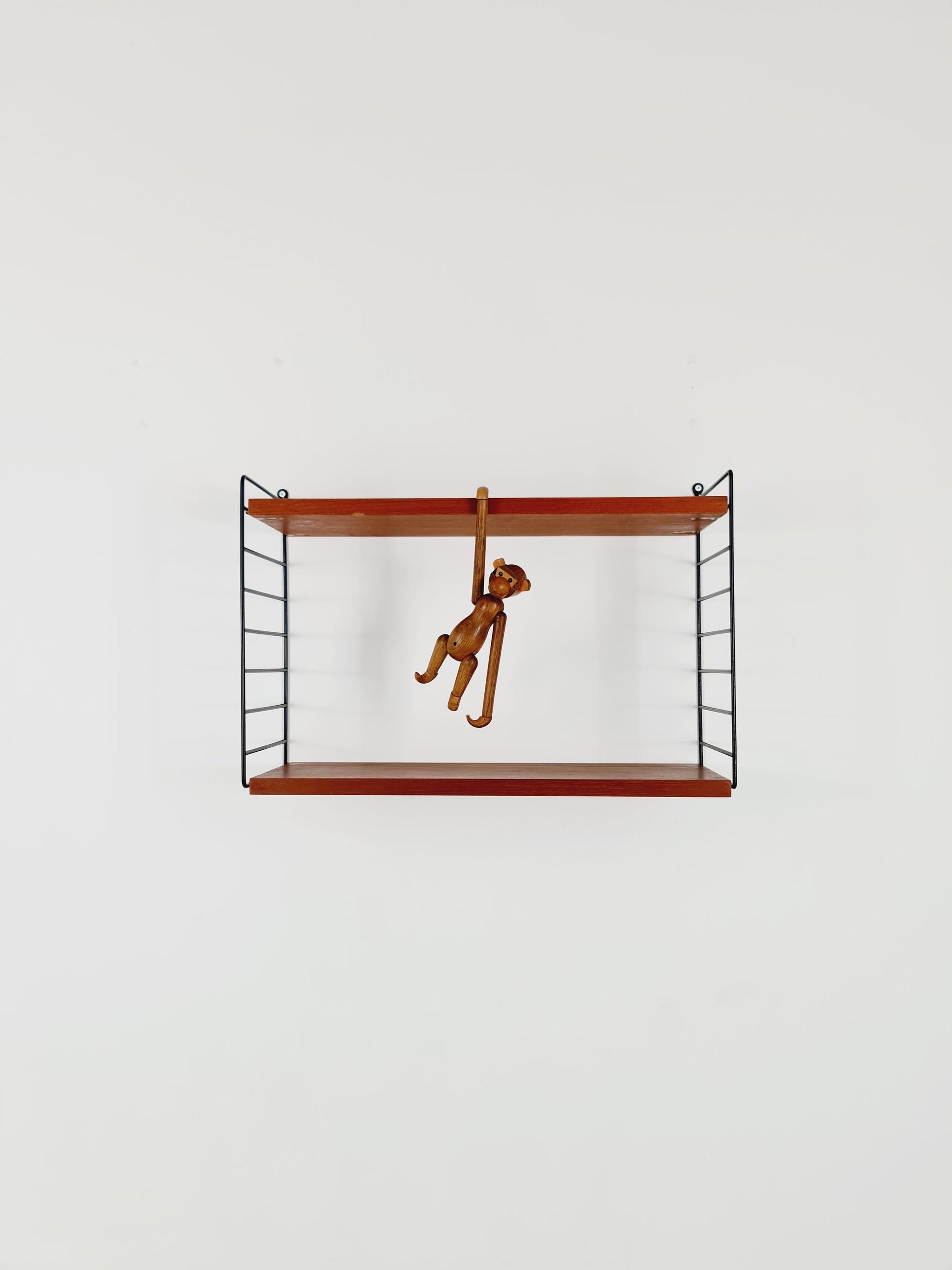 Original MCM Teak shelving system - consists of black lacquered metal ladders, from string Stockholm 1960s