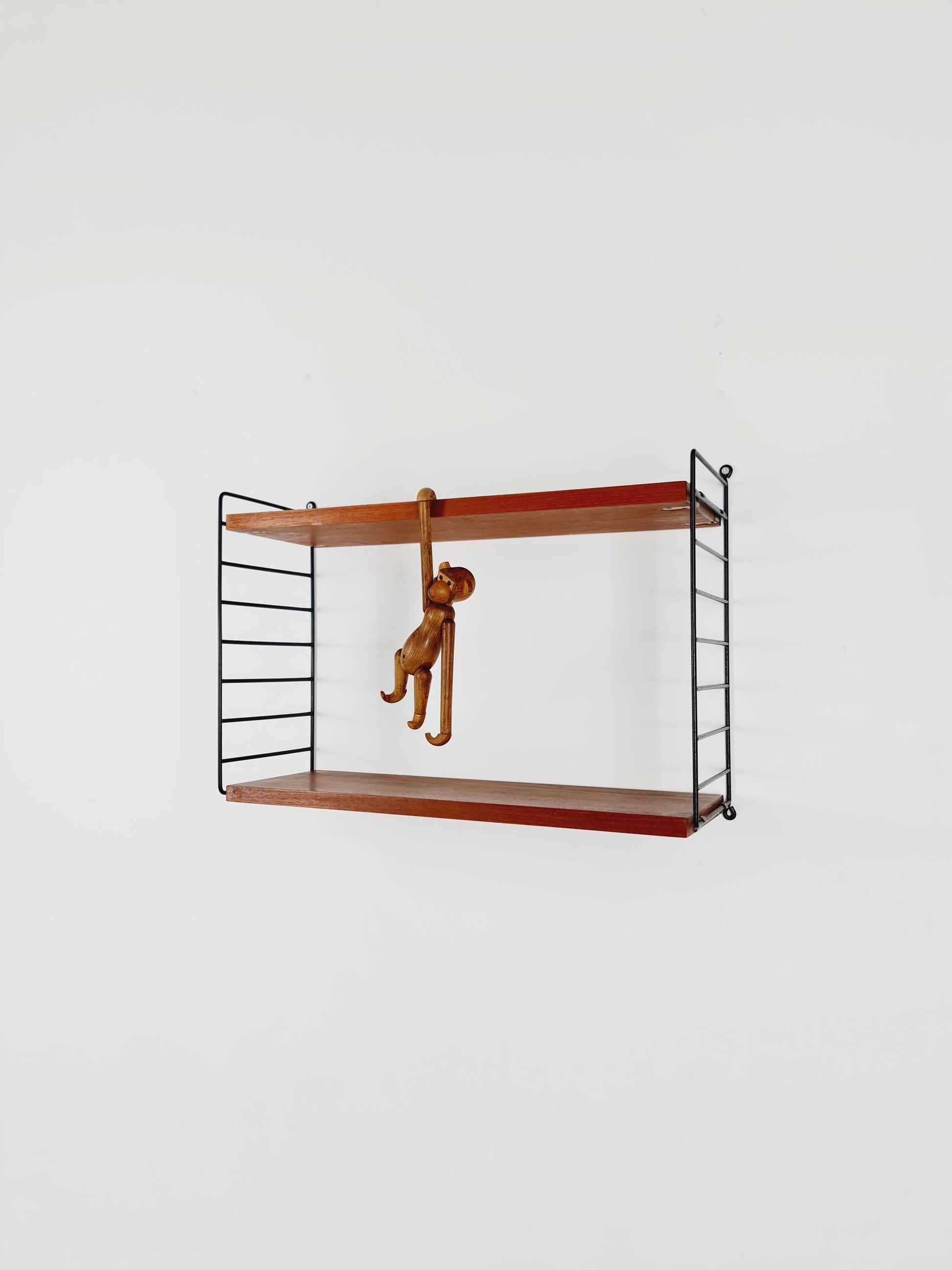 Original MCM Teak shelving system - consists of black lacquered metal ladders, from string Stockholm 1960s