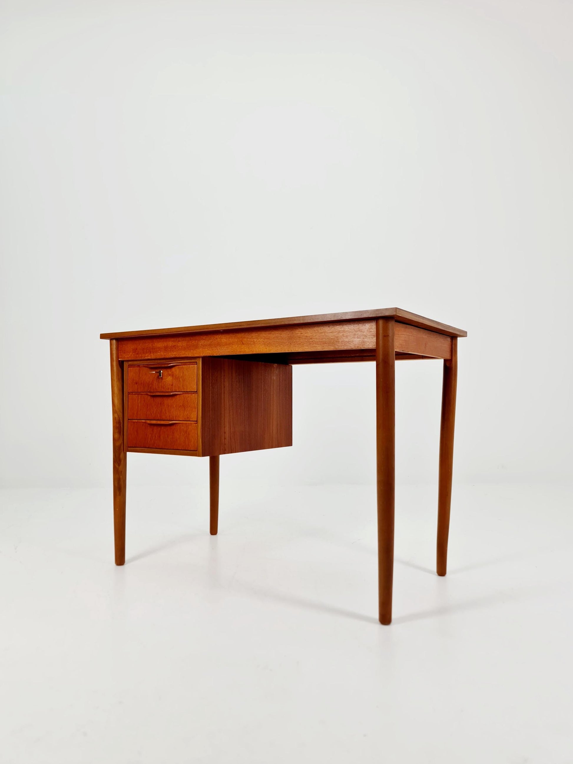 Mid century Danish teak desk By Gunnar Nielsen for Tiberaard 1960s