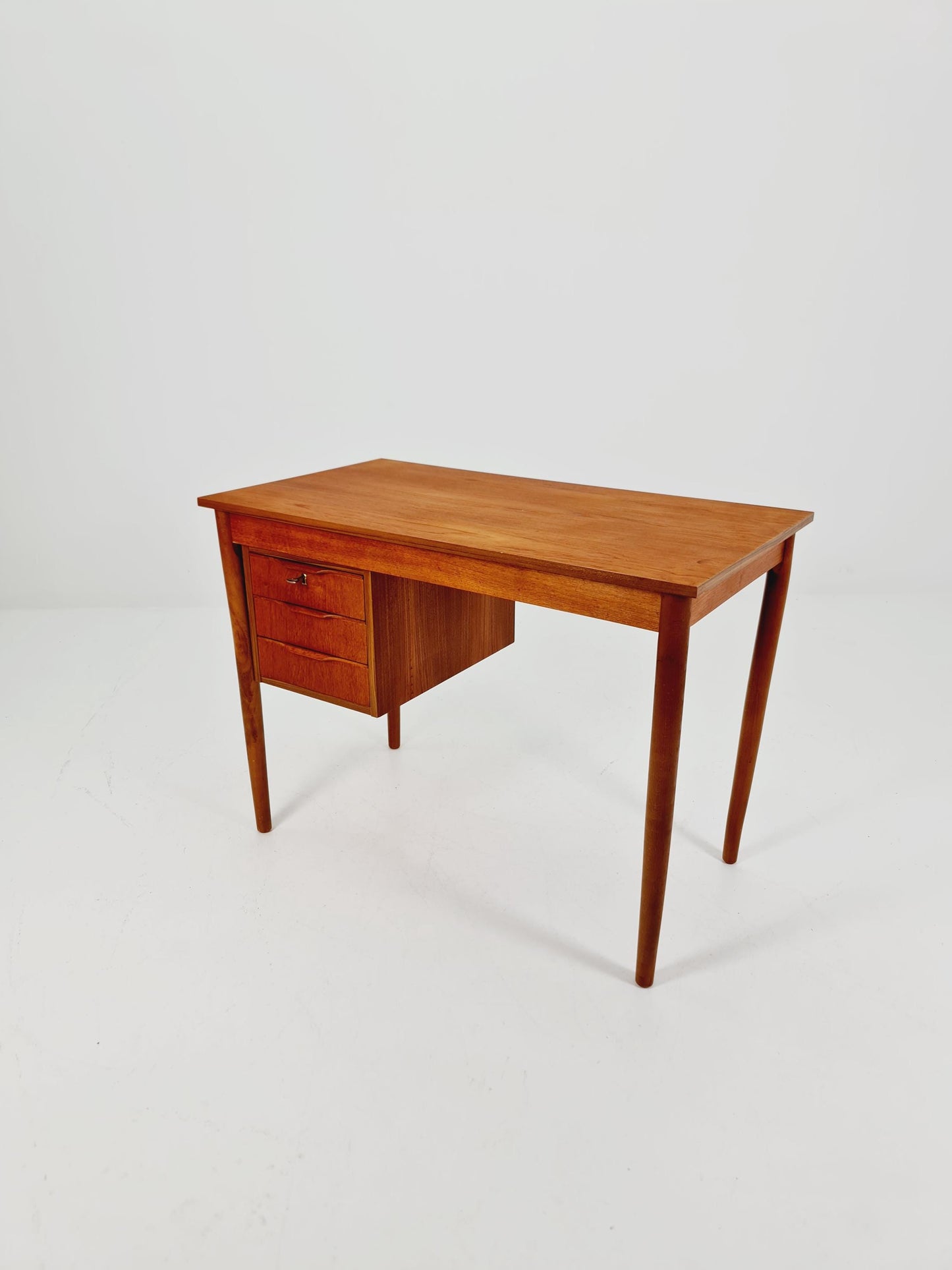 Mid century Danish teak desk By Gunnar Nielsen for Tiberaard 1960s
